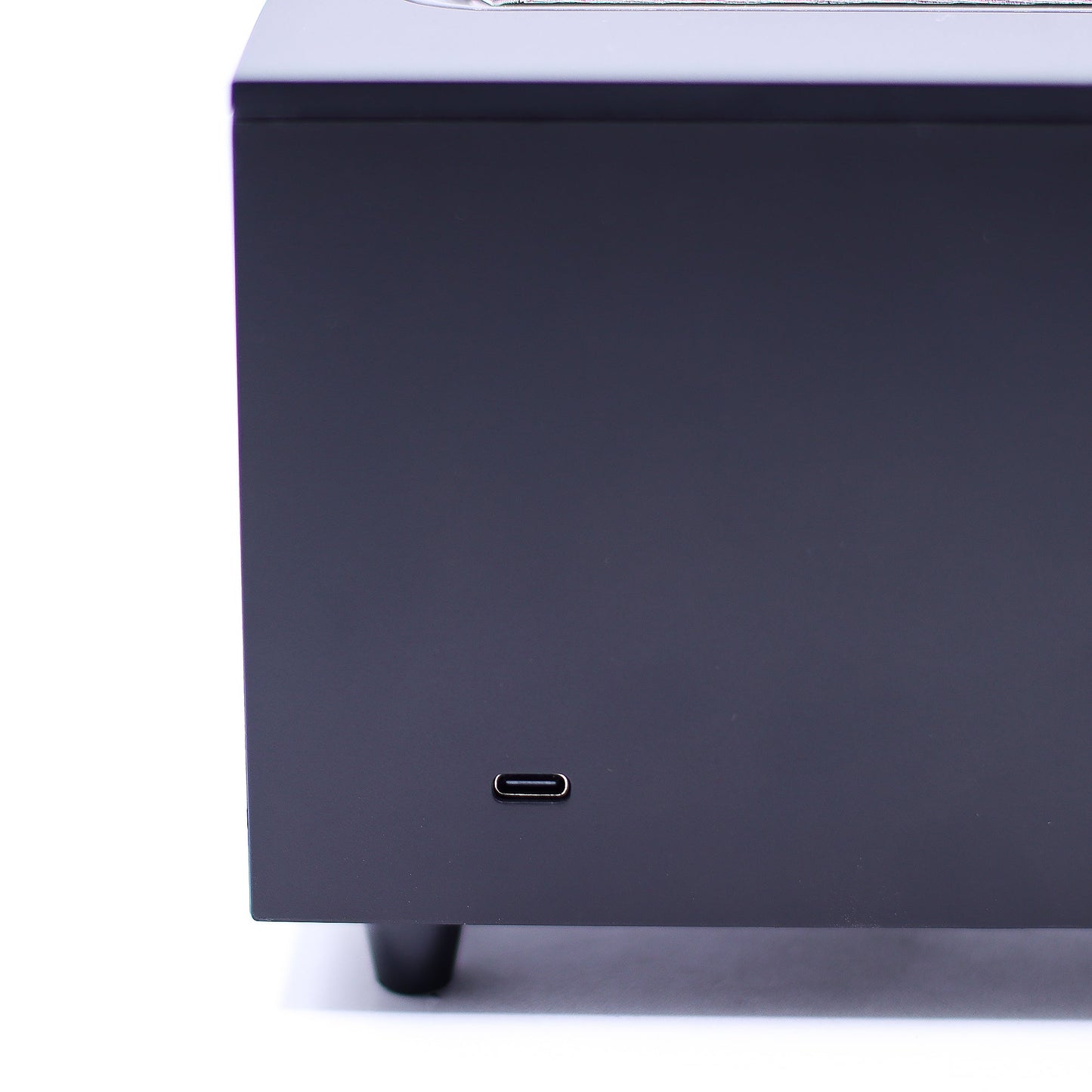 Colour-Change USB Aroma Diffuser – Black Flame Effect & Bird Sound, close-up of a USB-C port above two feet by Quintessential Holistic Health Ltd