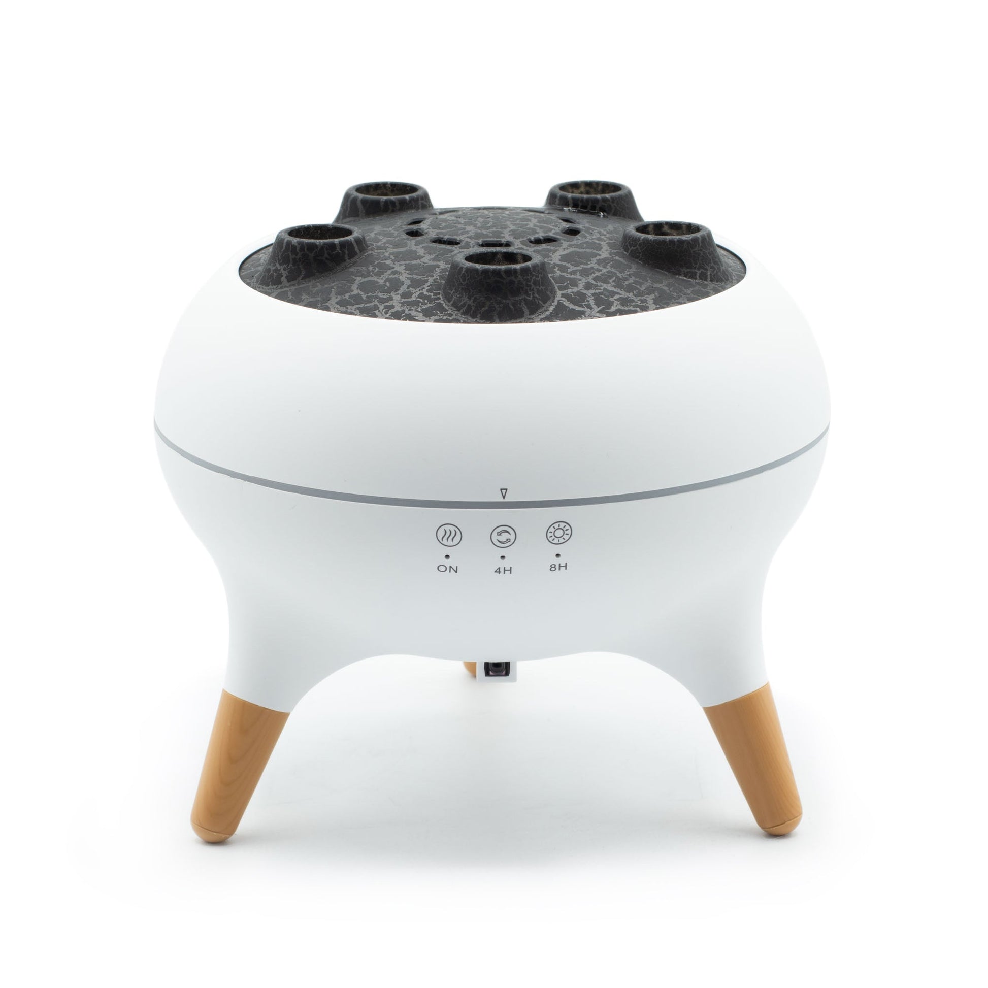 Colour-Changing USB Jellyfish Puff-Effect Aroma Diffuser with Remote, a white rounded unit with a perforated black top and three tan legs by Quintessential Holistic Health Ltd