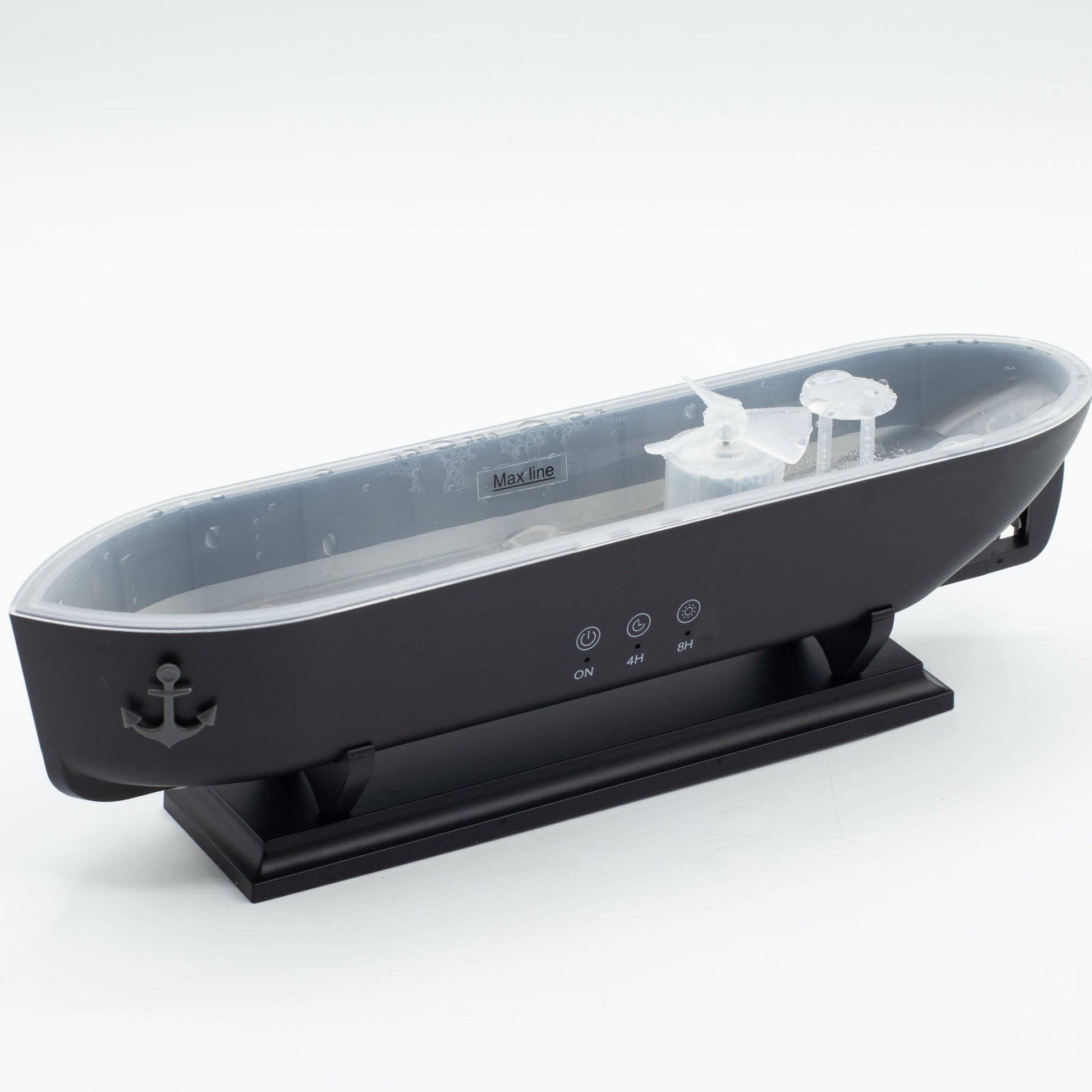 Colour-Changing USB Aroma Diffuser - Ship with Puff Effect, showing the open grey basin inside the black ship-shaped body, by Quintessential Holistic Health Ltd