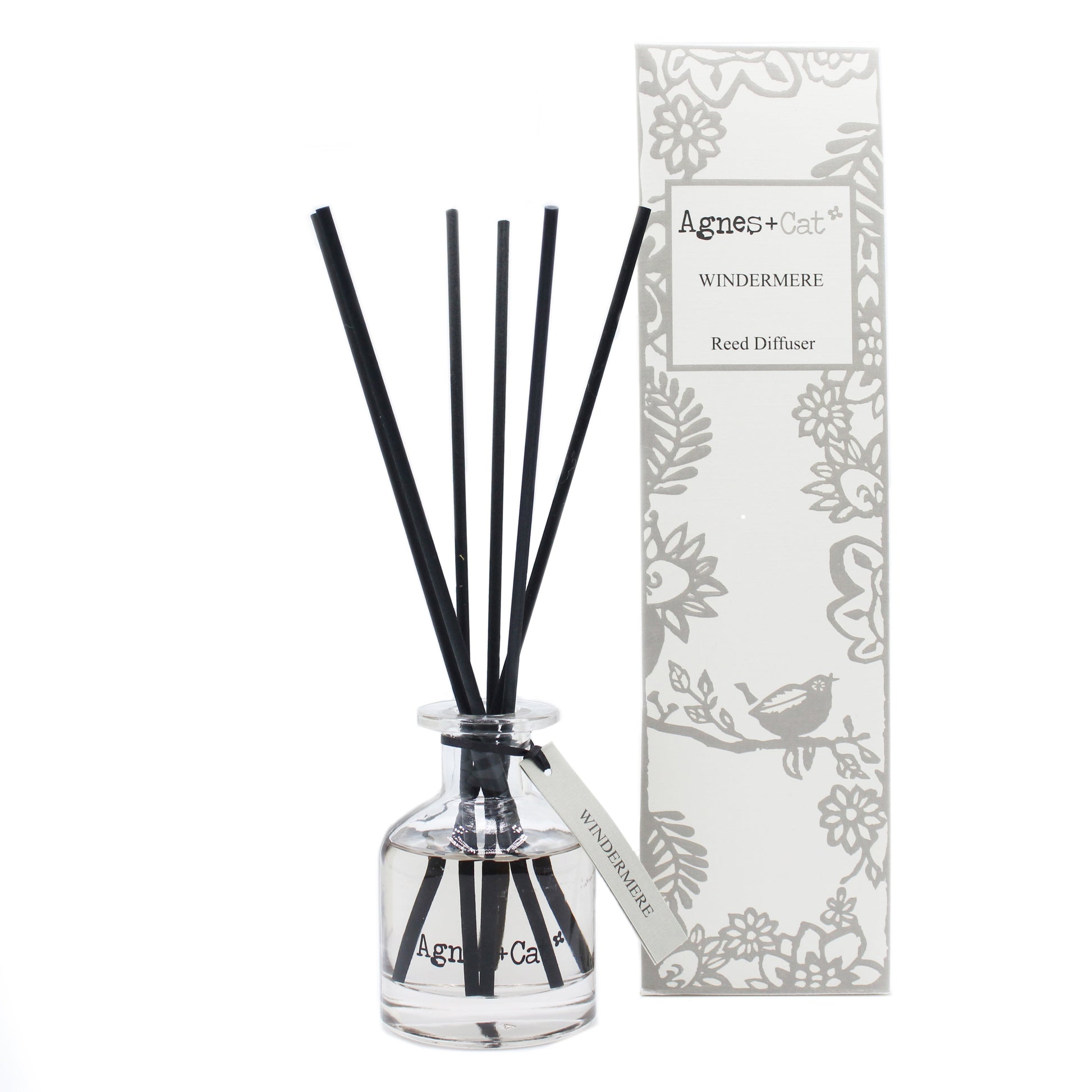 Reed Diffuser - Windermere - 140ml, clear bottle with black reeds beside a grey floral box, by Quintessential Holistic Health Ltd