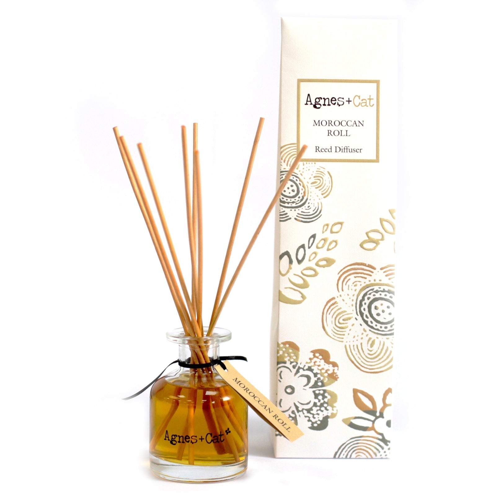 Reed Diffuser - Moroccan Roll - 140ml, amber bottle with natural-coloured reeds and a beige tag beside an illustrated box by Quintessential Holistic Health Ltd
