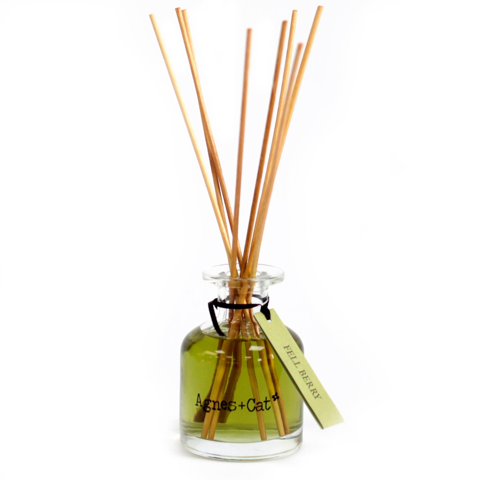 Reed Diffuser - Fell Berry - 140ml, green-tinted bottle with five natural-coloured reeds and a green hanging tag by Quintessential Holistic Health Ltd