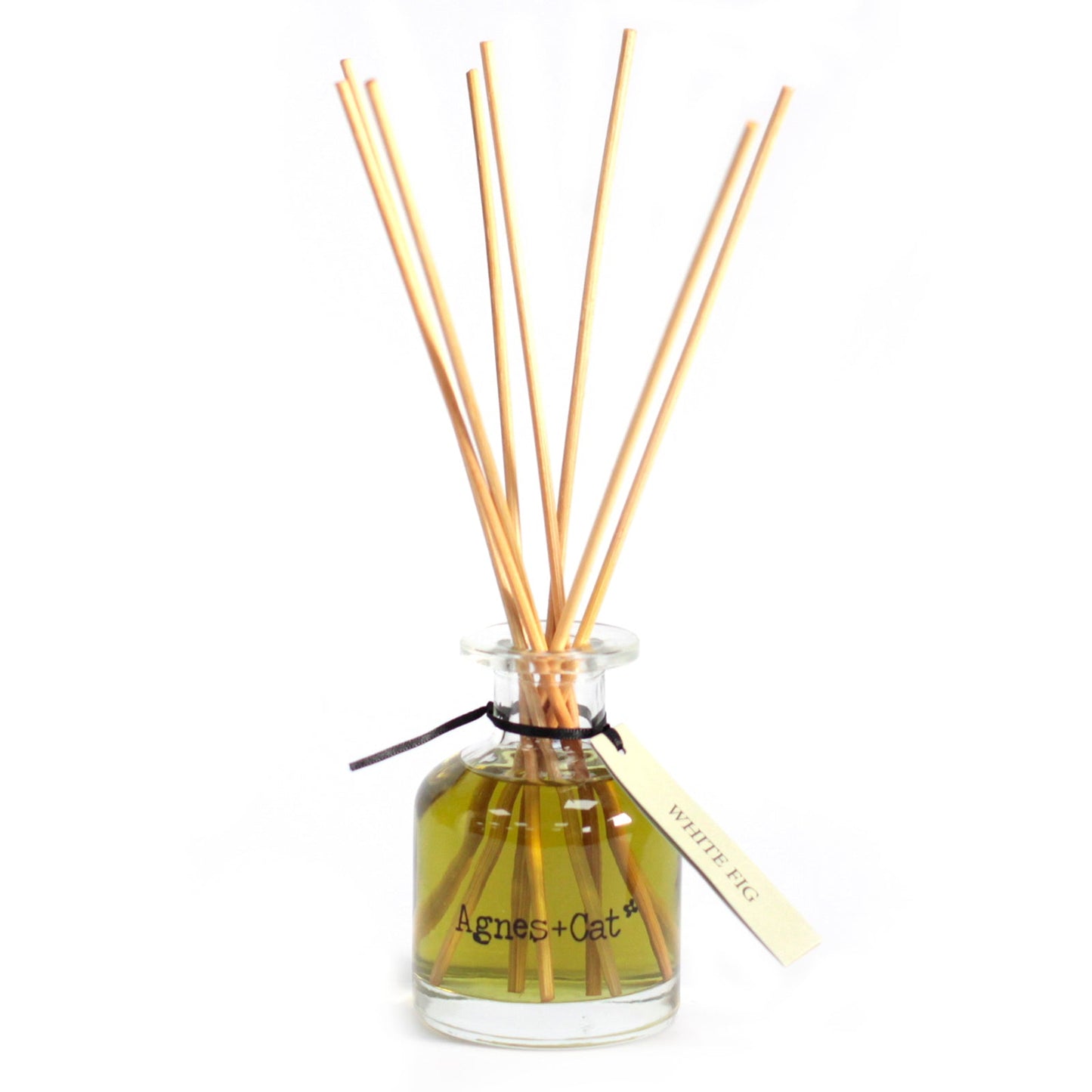 Reed Diffuser - White Fig - 140ml, yellow-green bottle with natural-coloured reeds and a cream hanging tag, by Quintessential Holistic Health Ltd