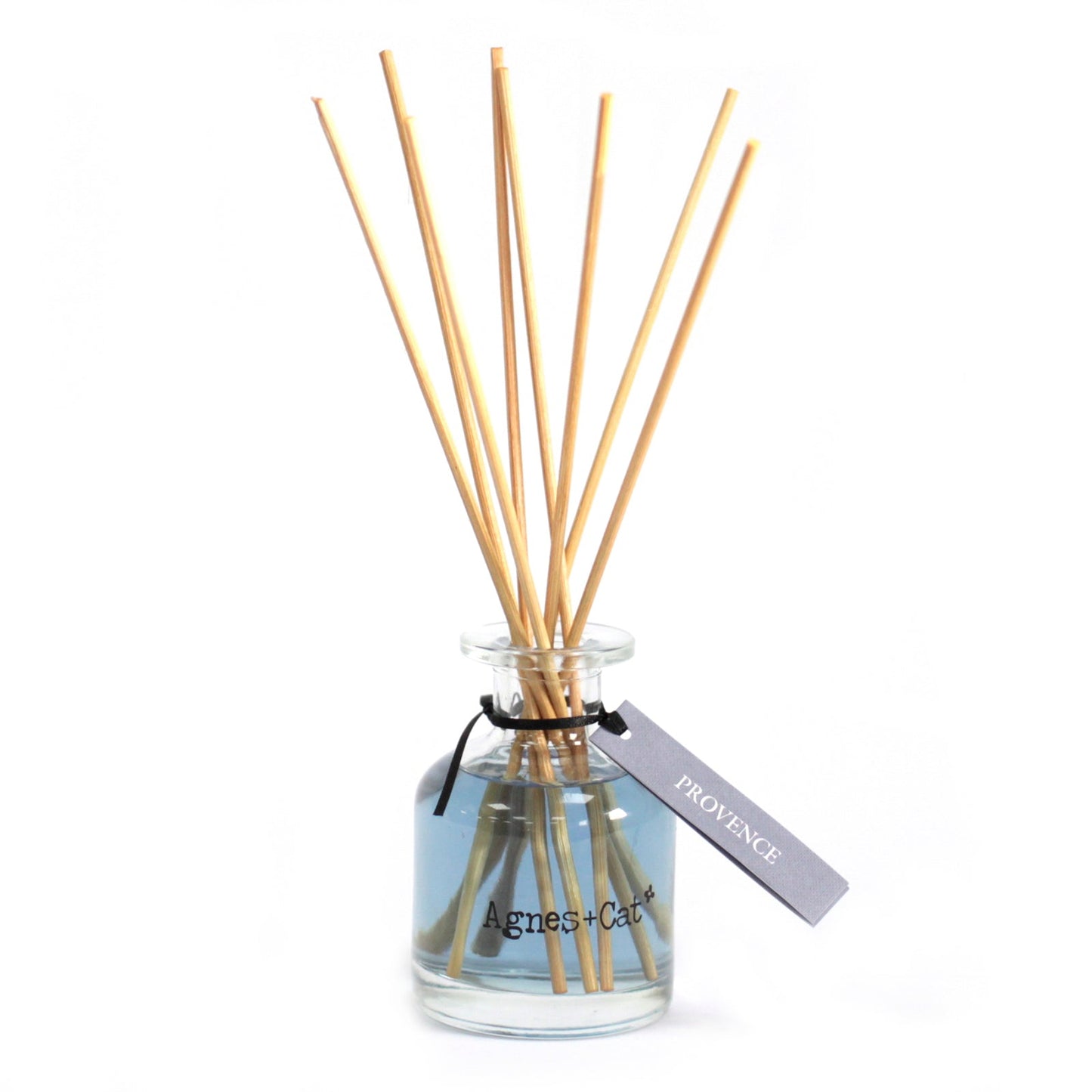 Reed Diffuser - Provence - 140ml, blue-tinted bottle with natural-coloured reeds and a grey-purple hanging tag by Quintessential Holistic Health Ltd