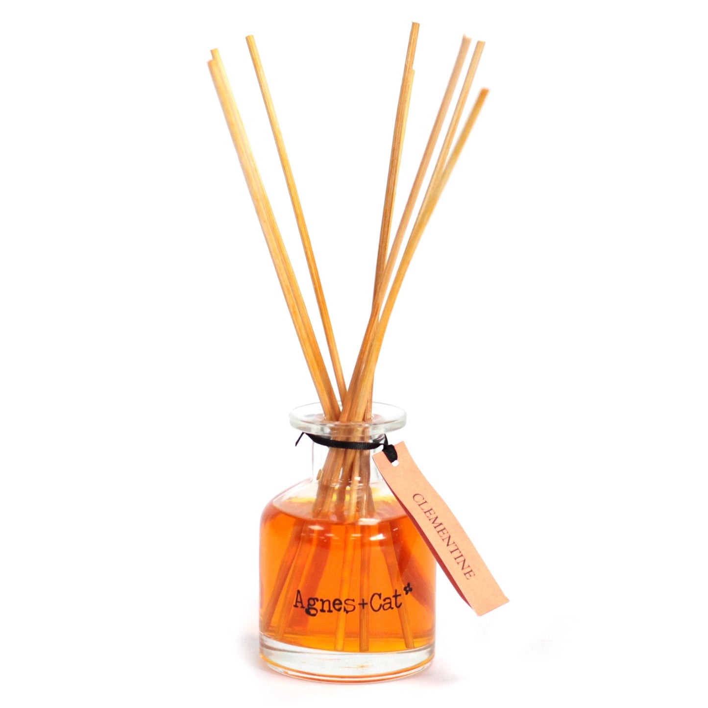 Reed Diffuser - Clementine - 140ml, amber bottle with six fanned natural-coloured reeds and an orange hanging tag by Quintessential Holistic Health Ltd