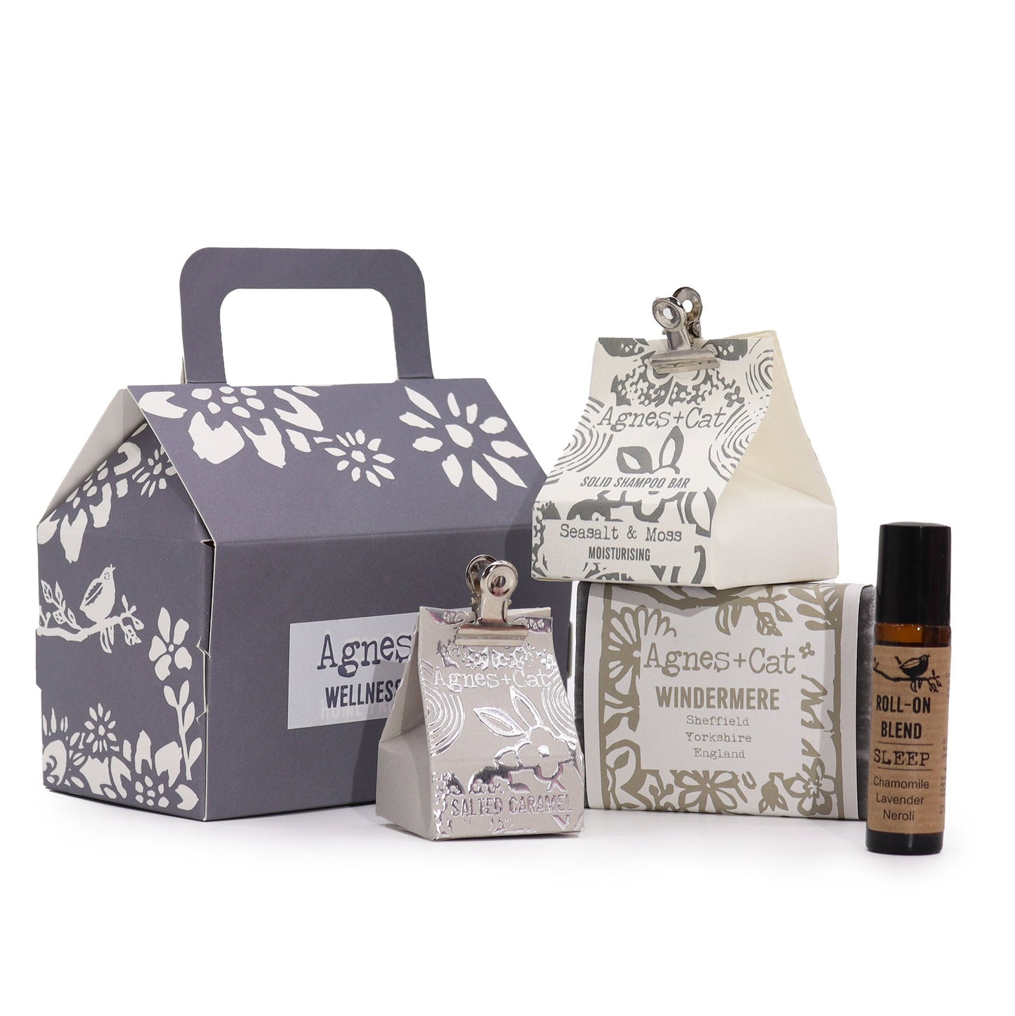 Handmade Personal Wellness Gift Set - Lake Breeze, grey floral box displayed with three patterned cartons and a small dark bottle, by Quintessential Holistic Health Ltd