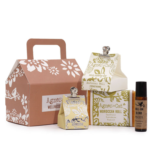 Handmade Personal Wellness Gift Set - Moroccan Morning, brown floral box displayed with three patterned cartons and a small dark bottle, by Quintessential Holistic Health Ltd