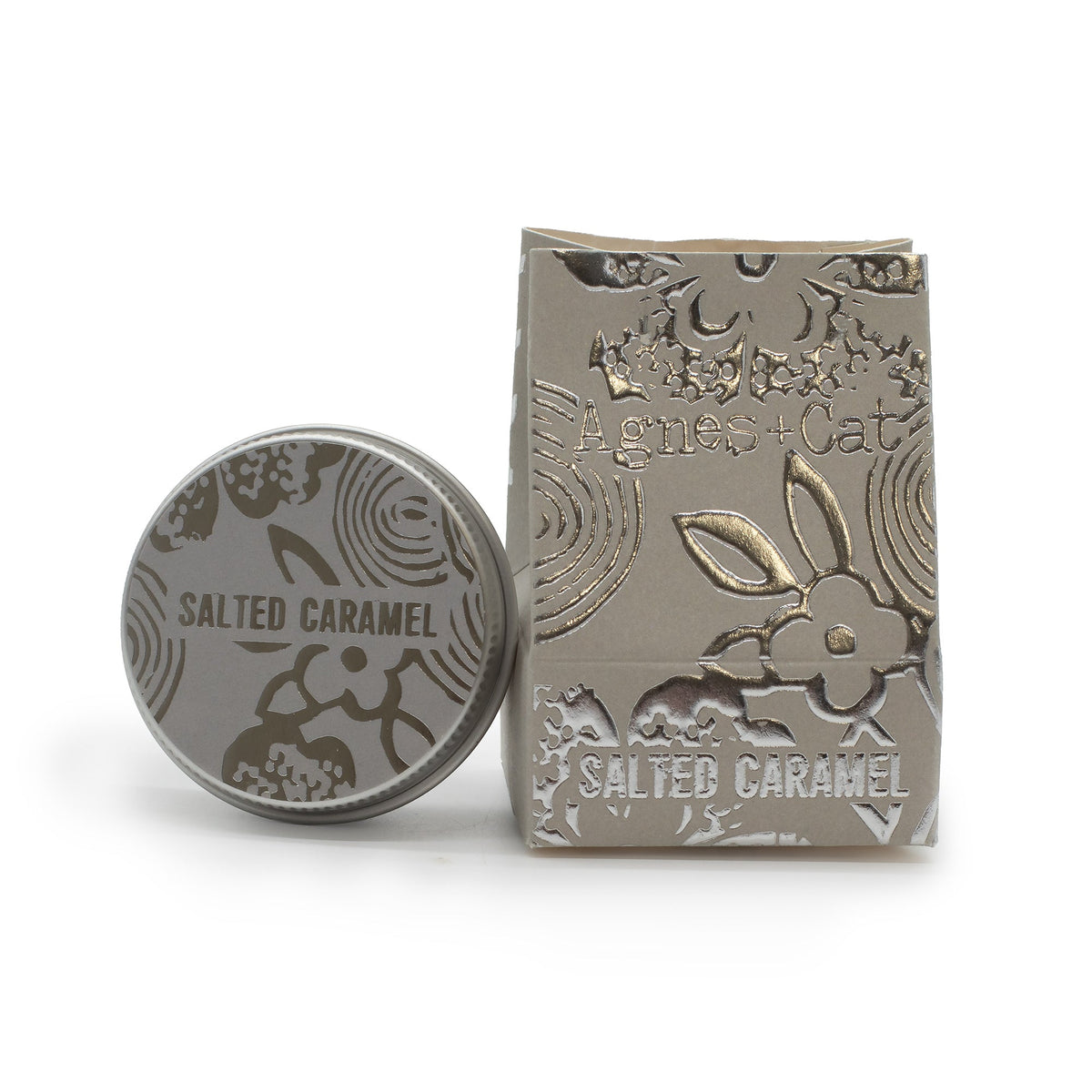 Hand-Poured Vegan-Friendly Natural Lip Balm - Salted Caramel with a silver-grey illustrated round tin and matching box by Quintessential Holistic Health Ltd
