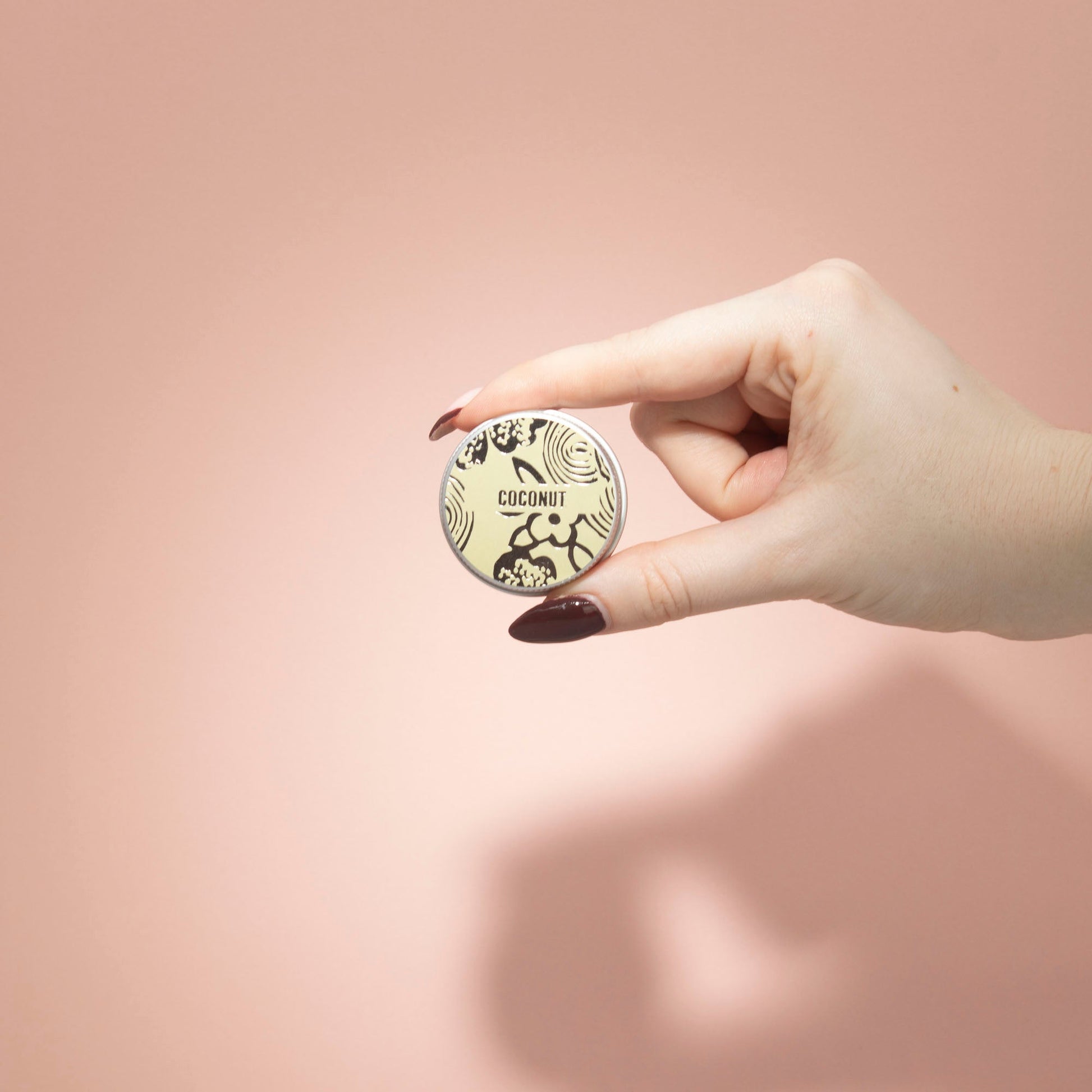 Hand-Poured Vegan-Friendly Natural Lip Balm - Coconut product packaging on clean background from Quintessential Holistic Health Ltd