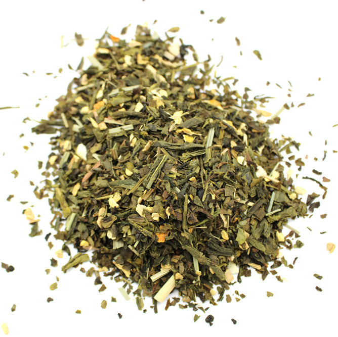 Classic Lemon and Ginger green tea blend, loose mound of mixed green and pale pieces from Quintessential Holistic Health.
