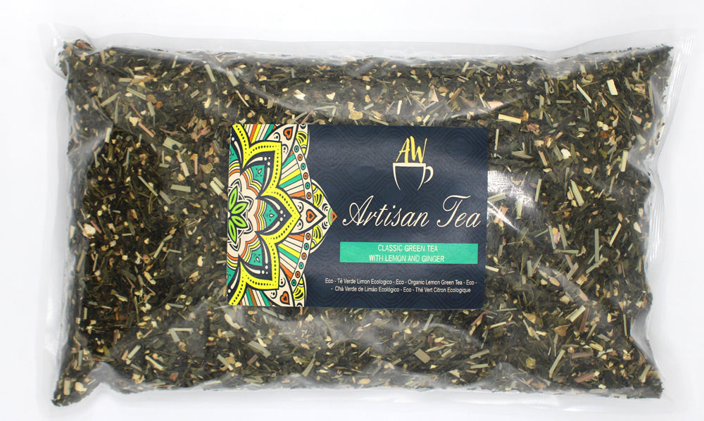 In a clear rectangular bag with an Artisan Tea label; Classic Lemon and Ginger green tea blend from Quintessential Holistic Health.