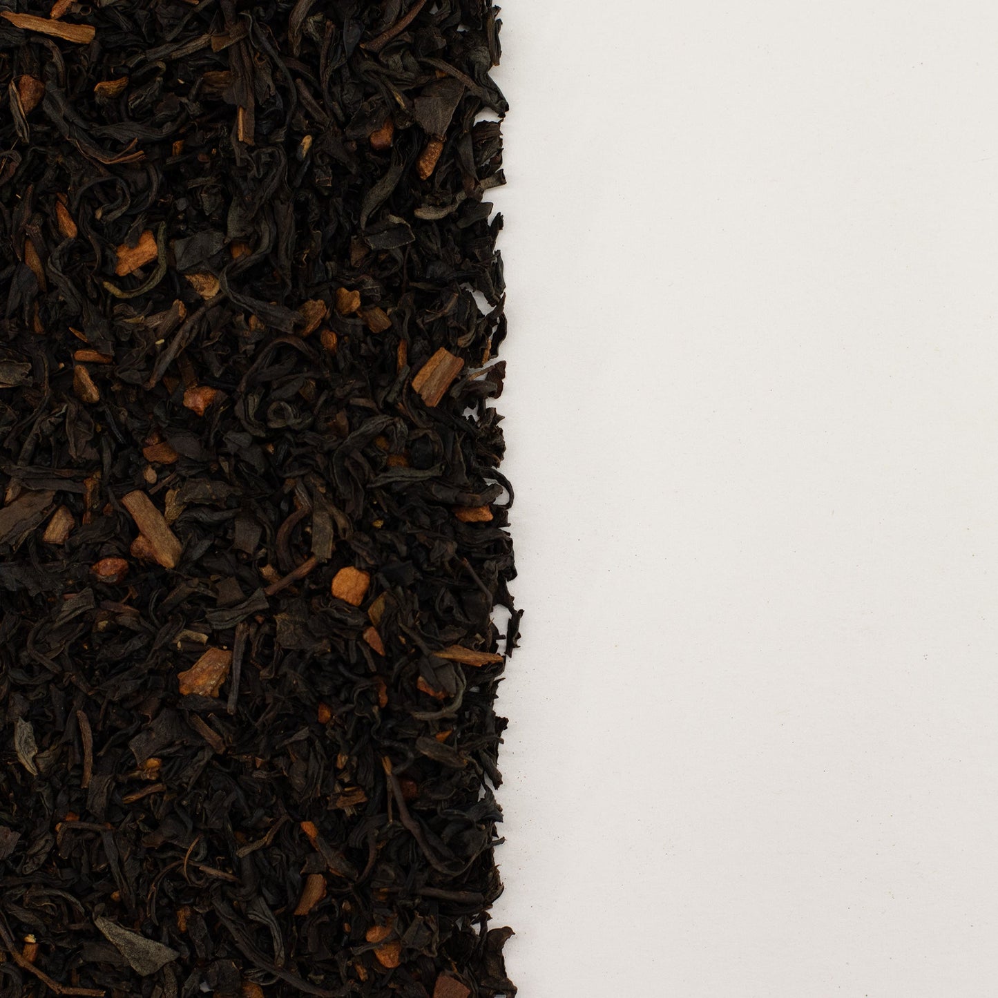 50g Organic Cinnamon Black Blend Artisan Tea product packaging on clean background from Quintessential Holistic Health Ltd