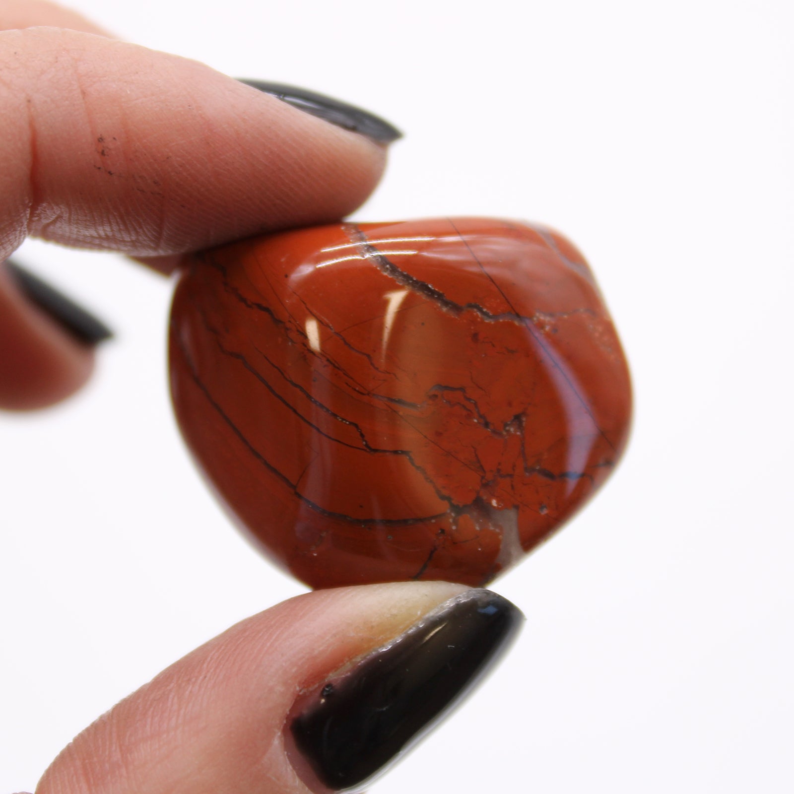12 x Polished Natural Tumble Stones - Medium / Red Jasper product packaging on clean background from Quintessential Holistic Health Ltd