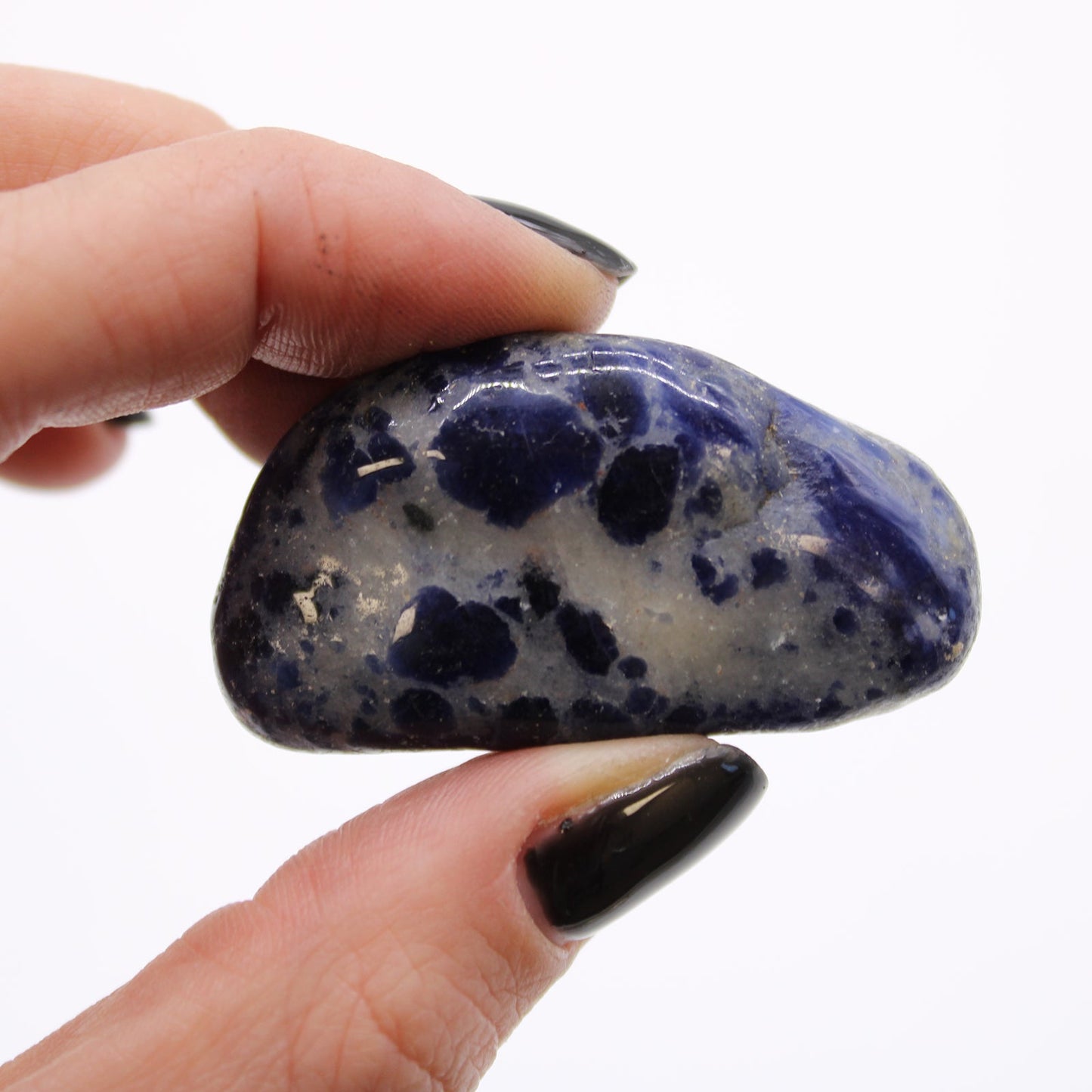 12 x Polished Natural Tumble Stones - Medium / Pure Blue Sodalite product packaging on clean background from Quintessential Holistic Health Ltd