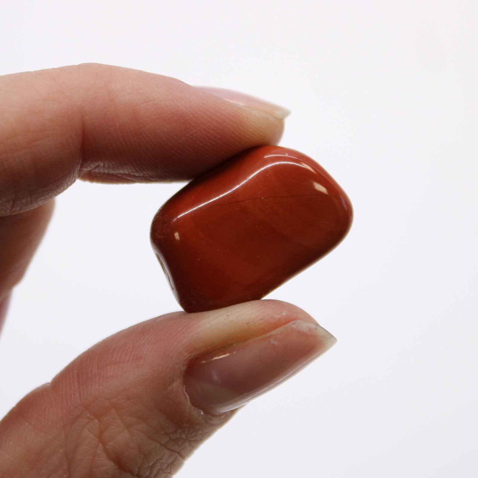 24 x Polished Natural Tumble Stones- Small / Red Jasper product packaging on clean background from Quintessential Holistic Health Ltd