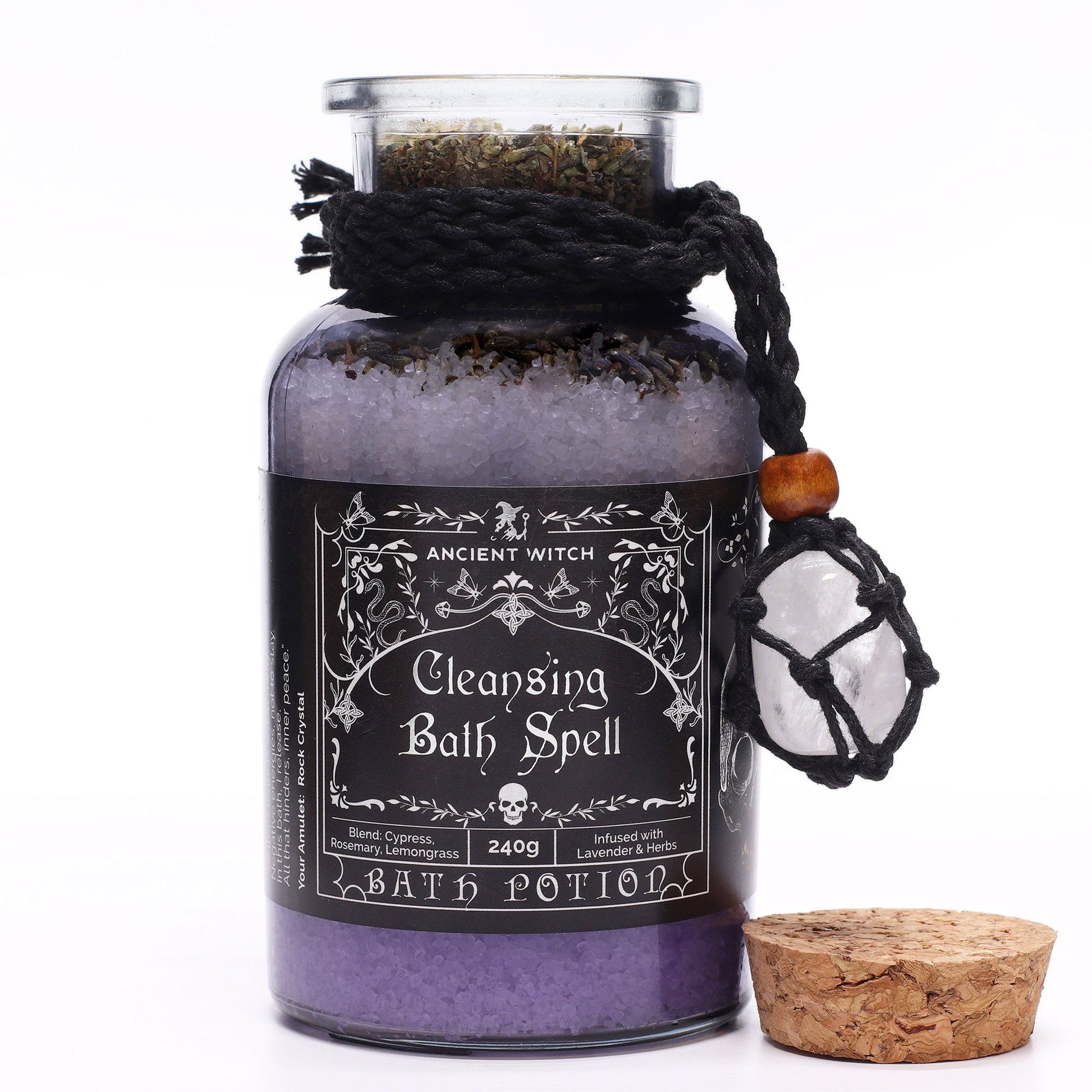 Vegan Bath Spell Potion & Rock Crystal Amulet - Cleansing, purple bottle with black cord and its cork placed beside it by Quintessential Holistic Health Ltd