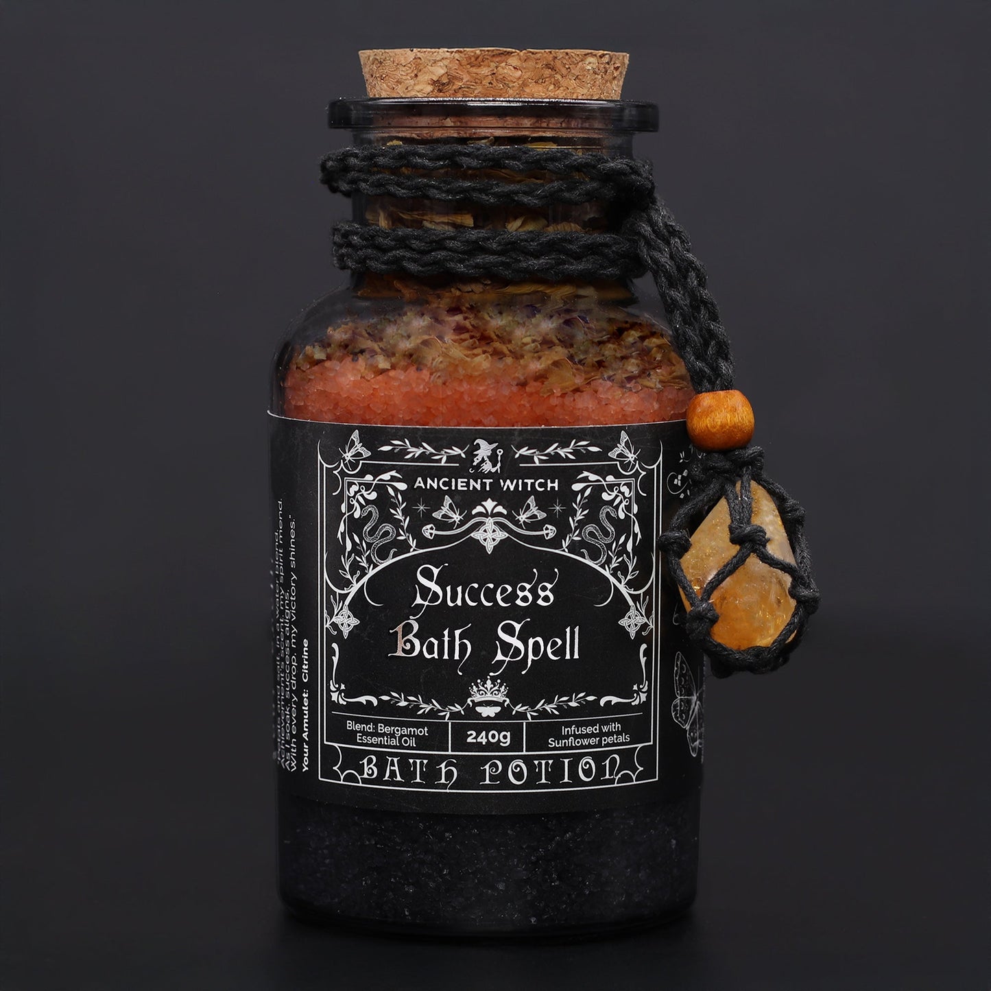 Vegan Bath Spell Potion & Citrine Crystal Amulet - Success, corked orange and black bottle with braided cord and yellow stone charm, by Quintessential Holistic Health Ltd