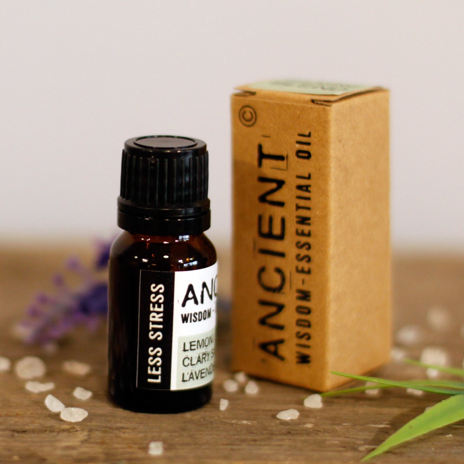 10ml Blended Essential Oil - Less Stress product packaging on clean background from Quintessential Holistic Health Ltd