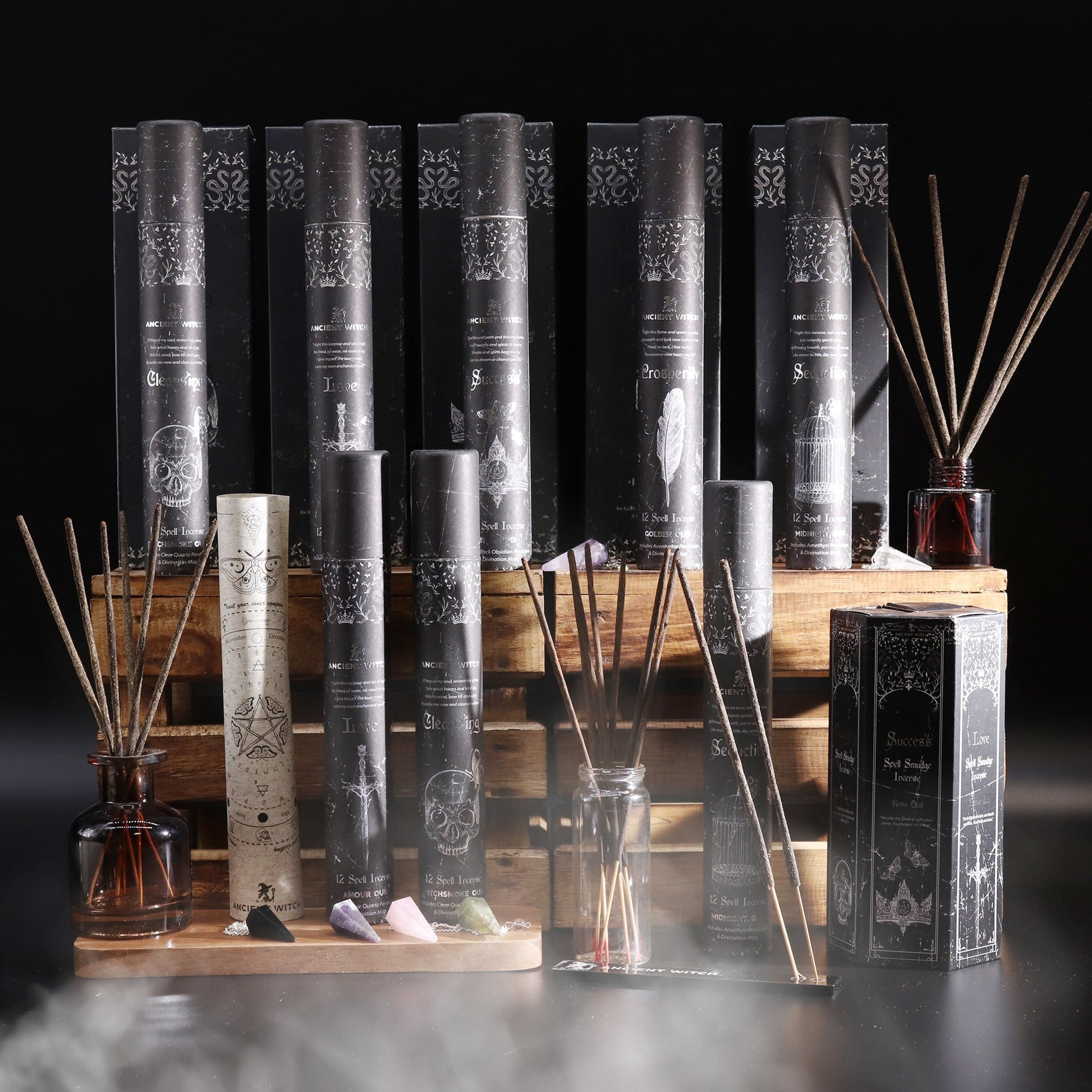 Ancient Witch Pyramid Shaped Spell Incense, Map and Crystal Pendulums Full Set - Cleansing / Success / Love / Prosperity and Seduction product packaging on clean background from Quintessential