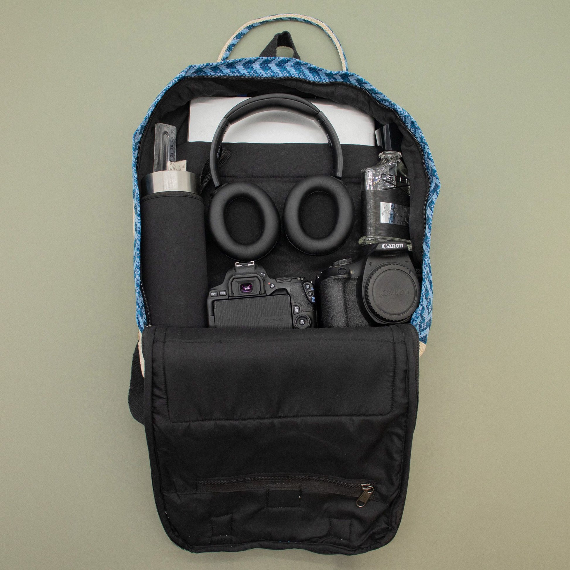 Large Kathmandu hemp backpack with blue Dhaka design, main product view from Quintessential Holistic Health.