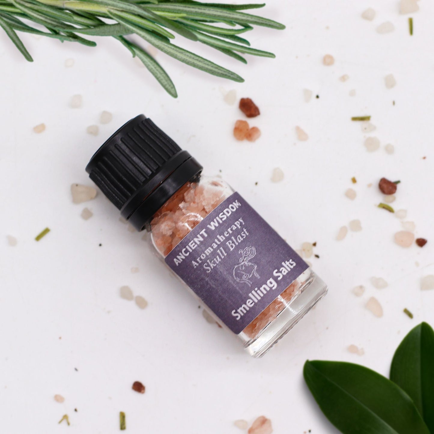 Skull Blast aromatherapy smelling salts in screw-top bottle, alternate product view from Quintessential Holistic Health.