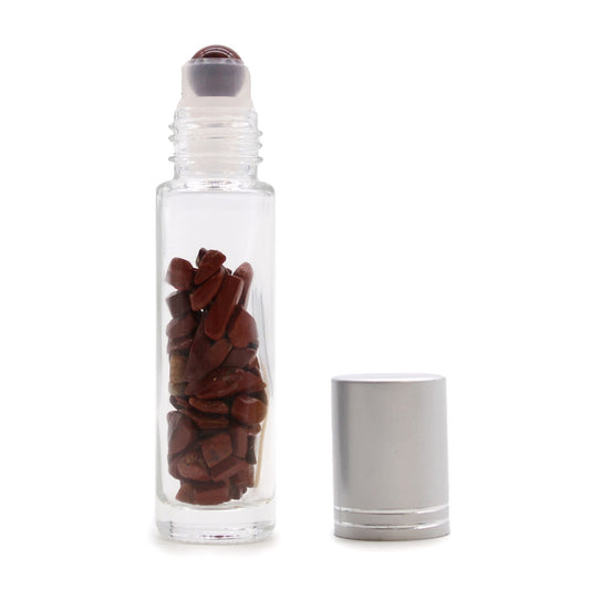 Red Jasper 10ml gemstone roller bottle with silver cap and visible stone pieces, product detail view from Quintessential Holistic Health.