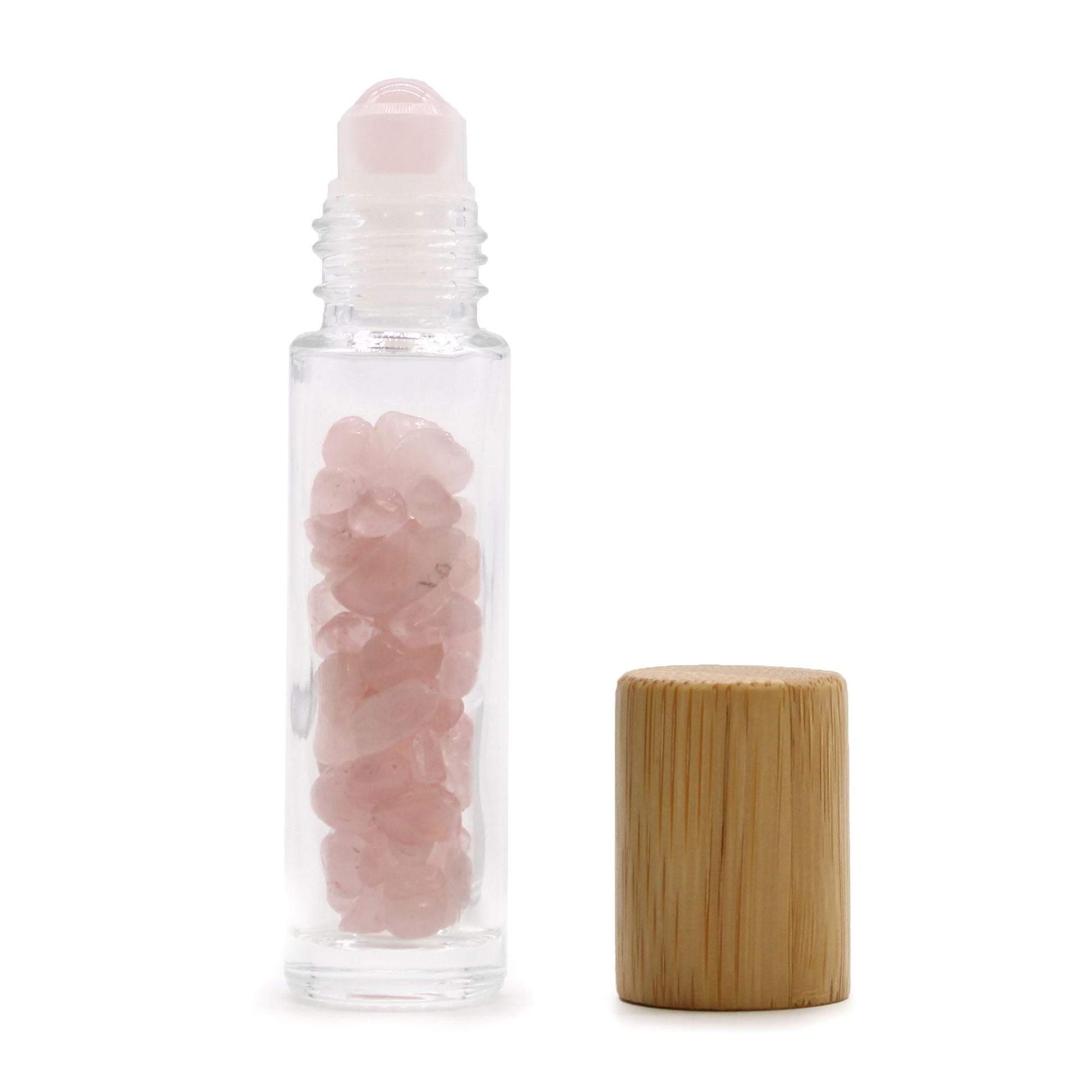 Rose Quartz 10ml gemstone roller bottle with wooden cap and visible stone pieces, product detail view from Quintessential Holistic Health.