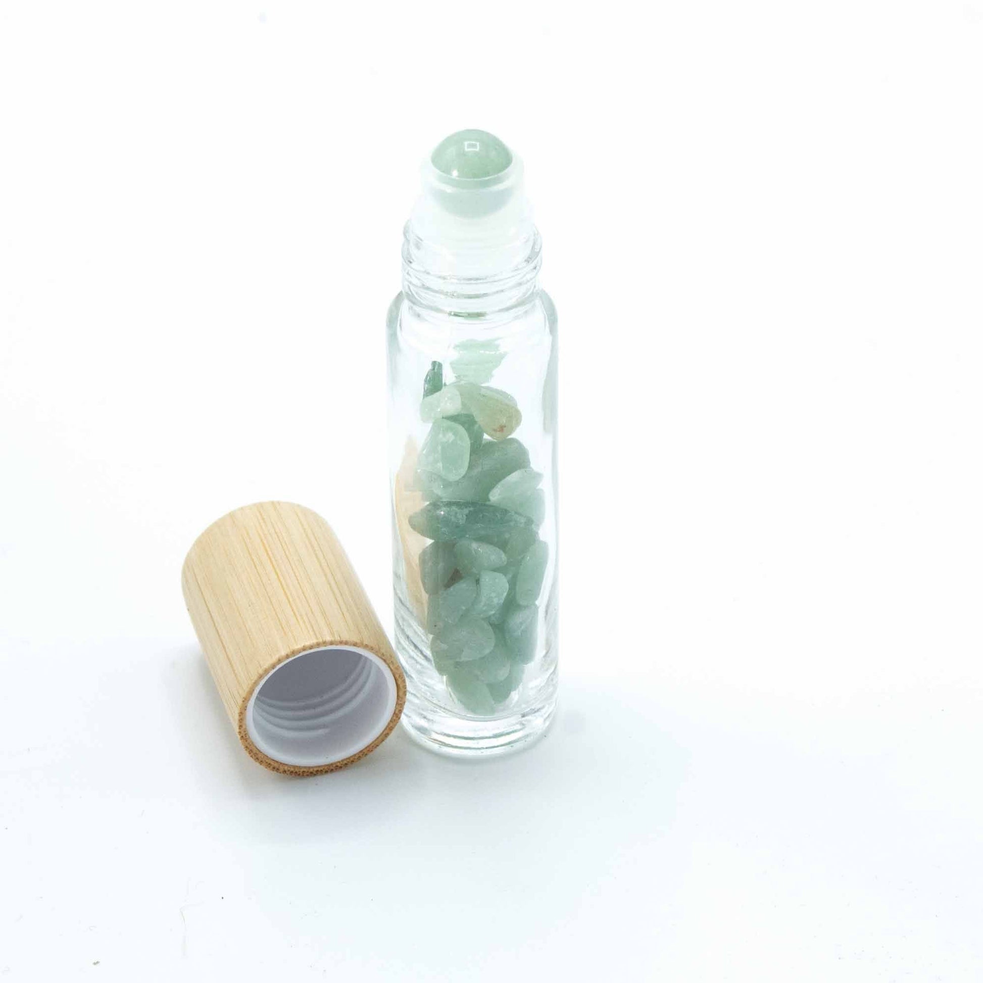 Aventurine 10ml gemstone roller bottle with wooden cap and visible stone pieces, secondary detail view from Quintessential Holistic Health.