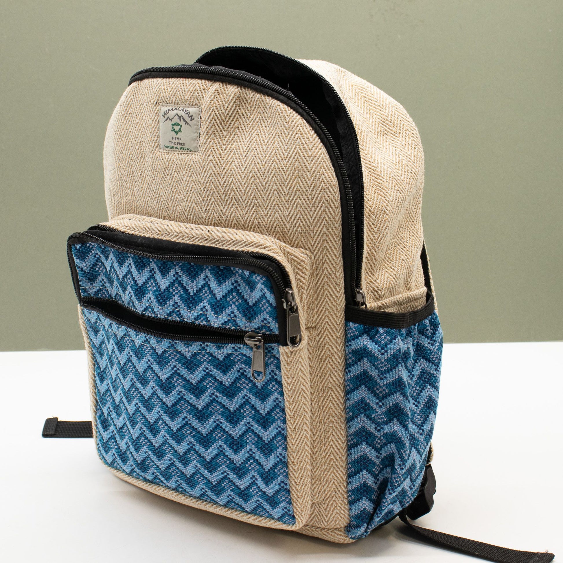 Standard Kathmandu hemp backpack with blue Dhaka design, main product view from Quintessential Holistic Health.
