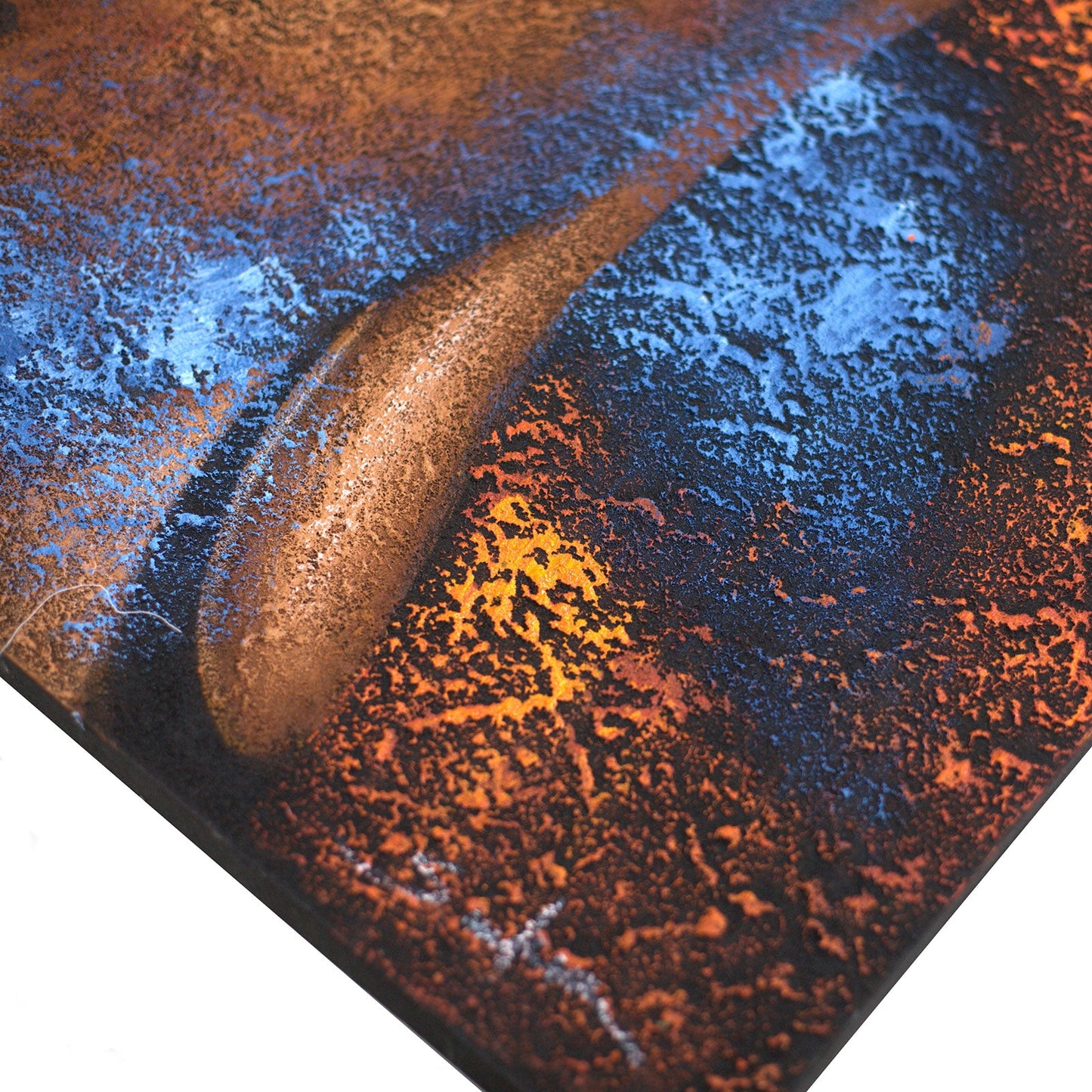 Hand-Painted Buddha Painting - Copper Face, close-up of a copper earlobe against a textured blue and orange surface, by Quintessential Holistic Health Ltd