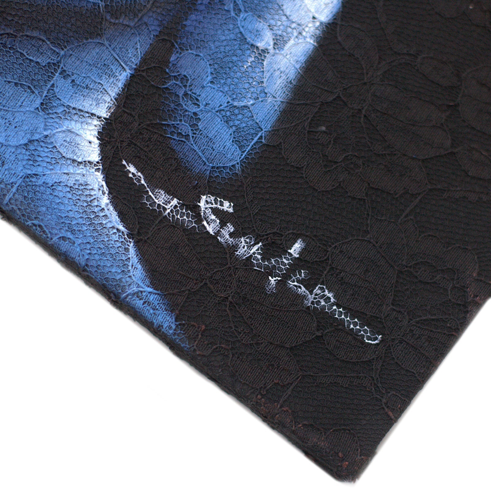 Hand Painted Buddha Painting - Black - Three Heads, close-up of textured blue and black paint with a white signature by Quintessential Holistic Health Ltd