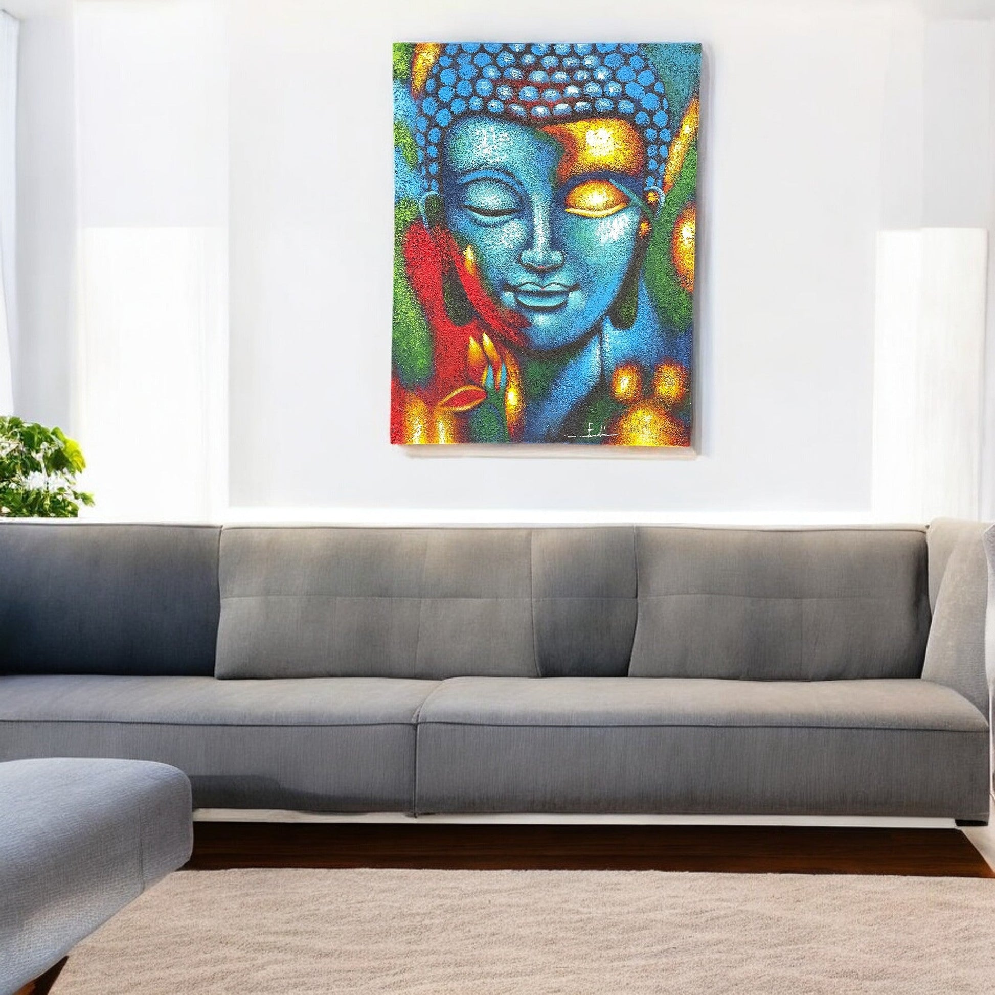 Hand-Painted Buddha Painting - Blue and Gold Flower, displayed on a white wall above a grey corner sofa, by Quintessential Holistic Health Ltd