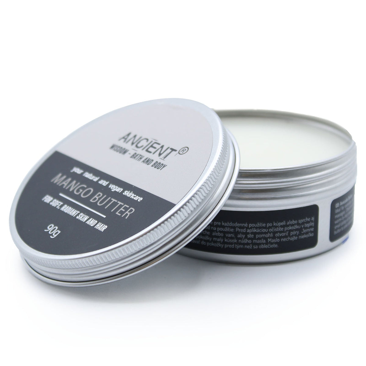 Vegan-Friendly Pure Body Butter - 90g - Mango in an open round tin with its labelled lid resting diagonally in front by Quintessential Holistic Health Ltd