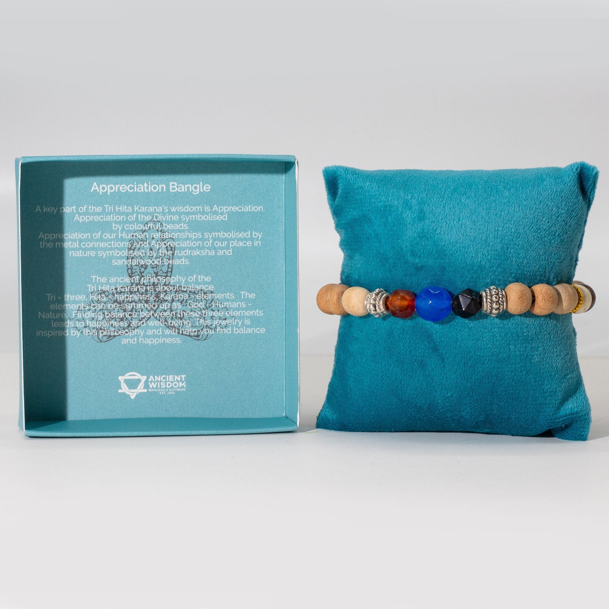 Tri Hita Karana Bracelet - Appreciation product packaging on clean background from Quintessential Holistic Health Ltd
