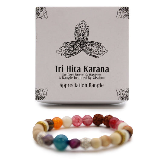 Tri Hita Karana Bracelet - Appreciation product packaging on clean background from Quintessential Holistic Health Ltd
