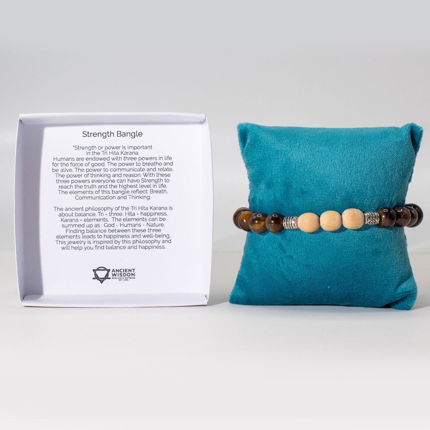 Tri Hita Karana Bracelet - Strength product packaging on clean background from Quintessential Holistic Health Ltd