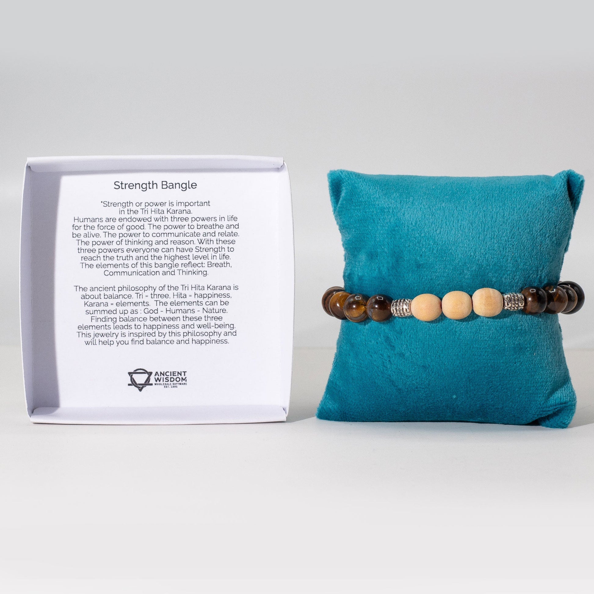 Tri Hita Karana Bracelet - Strength product packaging on clean background from Quintessential Holistic Health Ltd