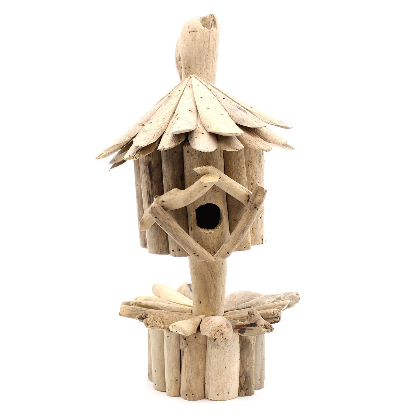 Handmade Recycled Driftwood Bird Box on a Stand, front view with a round entrance, layered roof and circular log base, by Quintessential Holistic Health Ltd
