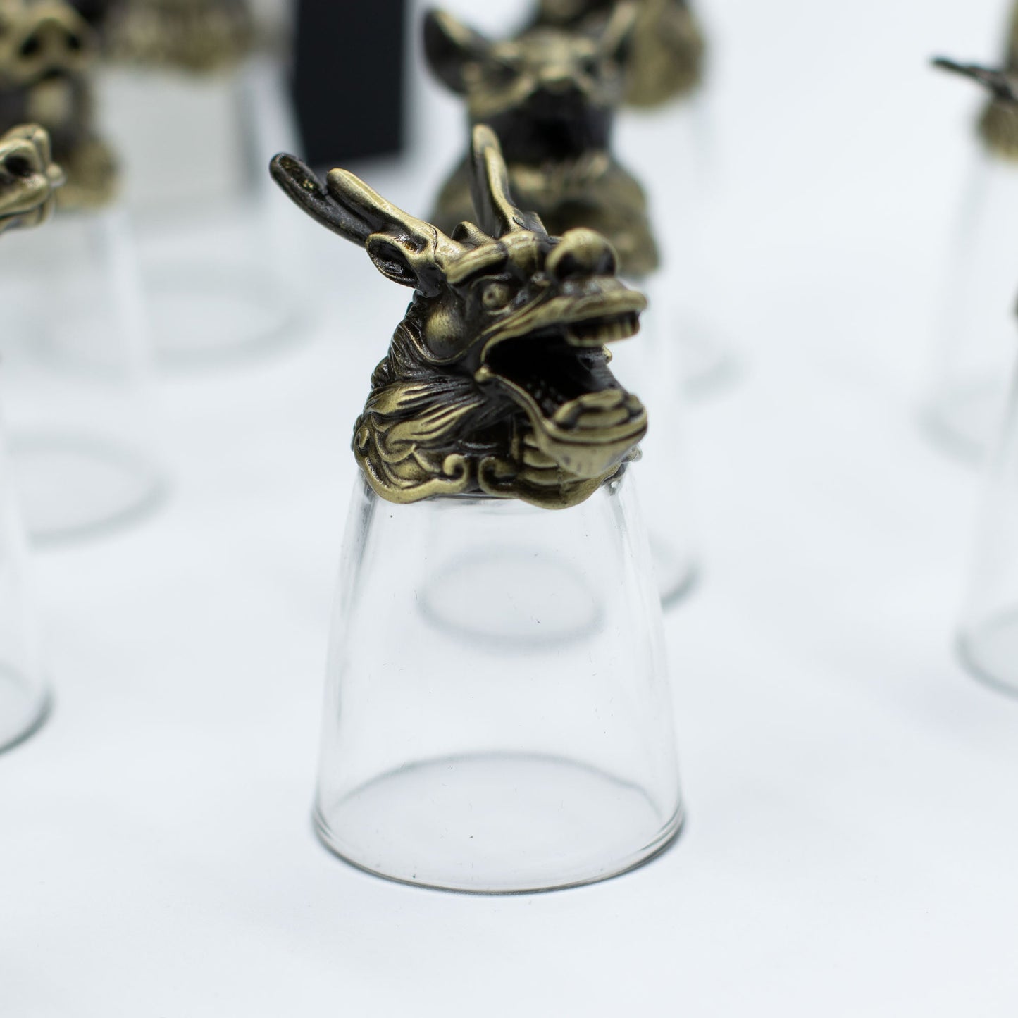 Set of 12 x 25ml Mystical Zodiac Creatures Glasses - Antique Bronze product packaging on clean background from Quintessential Holistic Health Ltd