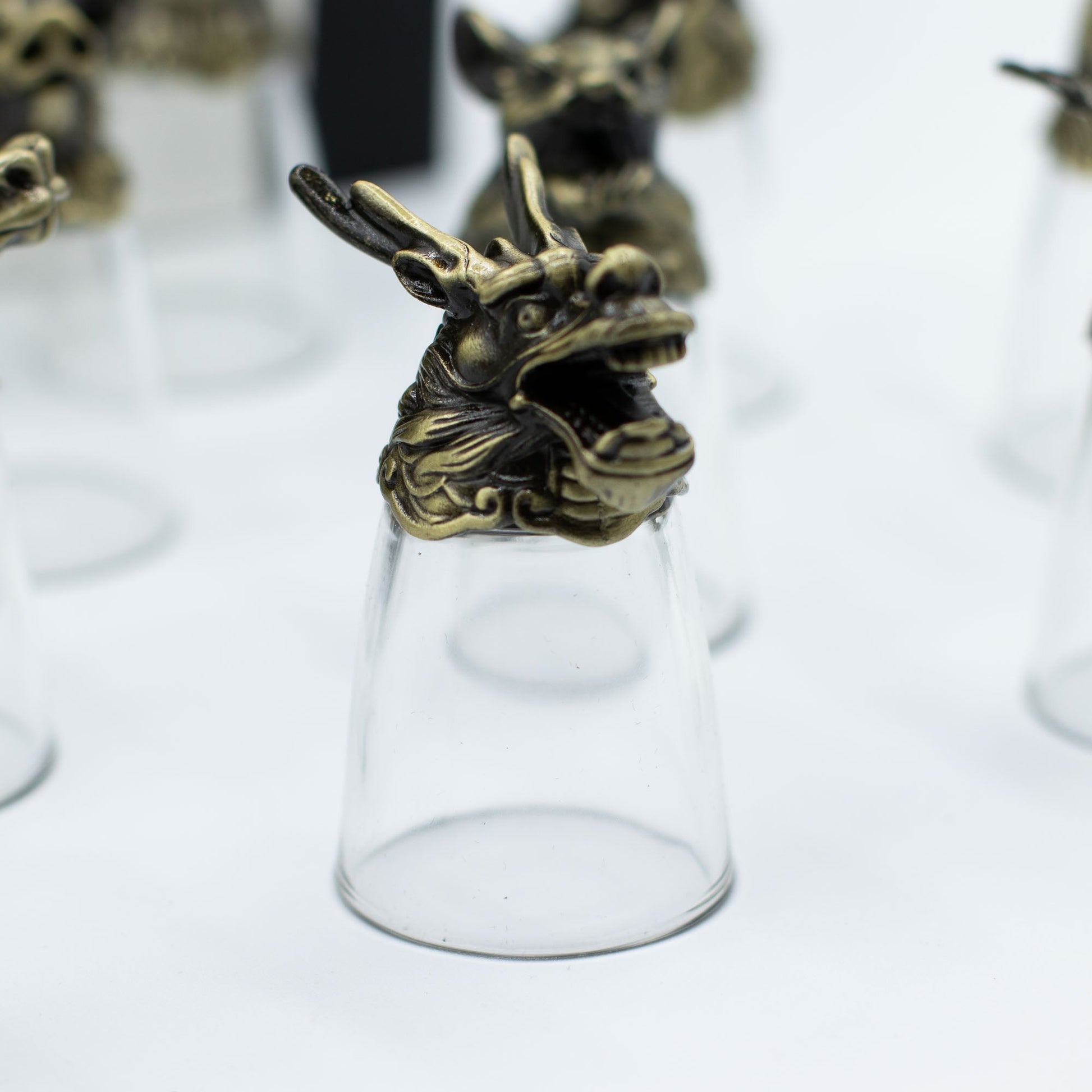 Set of 12 x 25ml Mystical Zodiac Creatures Glasses - Antique Bronze product packaging on clean background from Quintessential Holistic Health Ltd