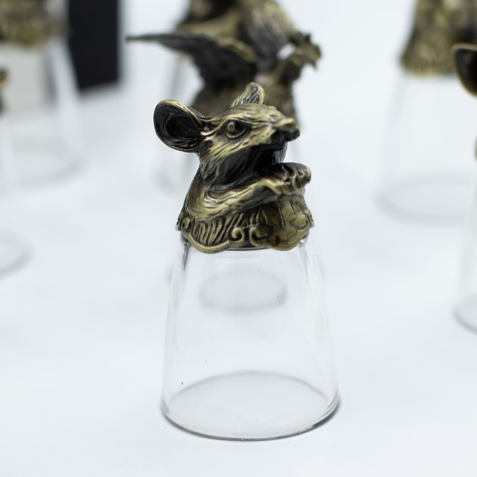 Set of 12 x 25ml Mystical Zodiac Creatures Glasses - Antique Bronze product packaging on clean background from Quintessential Holistic Health Ltd
