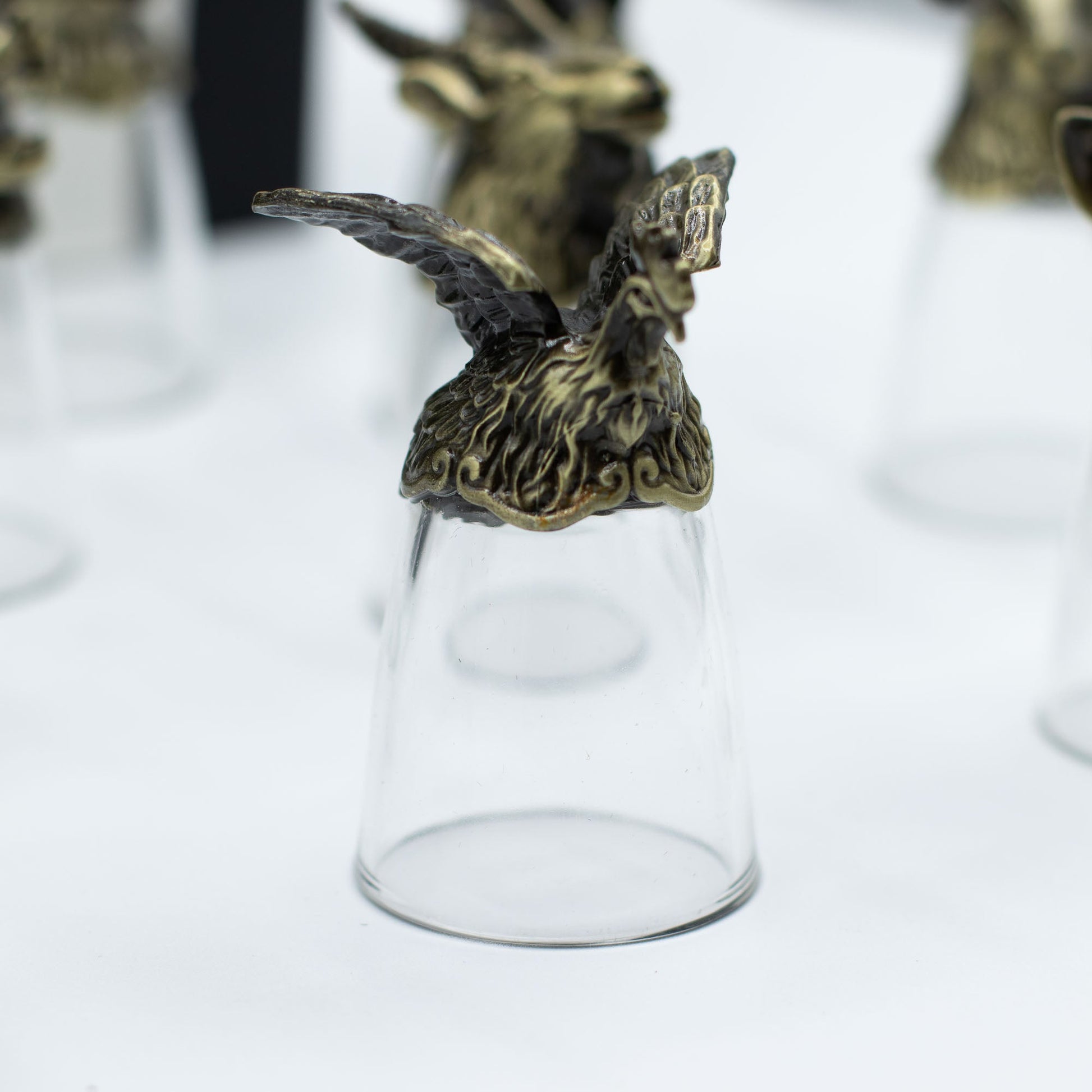 Set of 12 x 25ml Mystical Zodiac Creatures Glasses - Antique Bronze product packaging on clean background from Quintessential Holistic Health Ltd