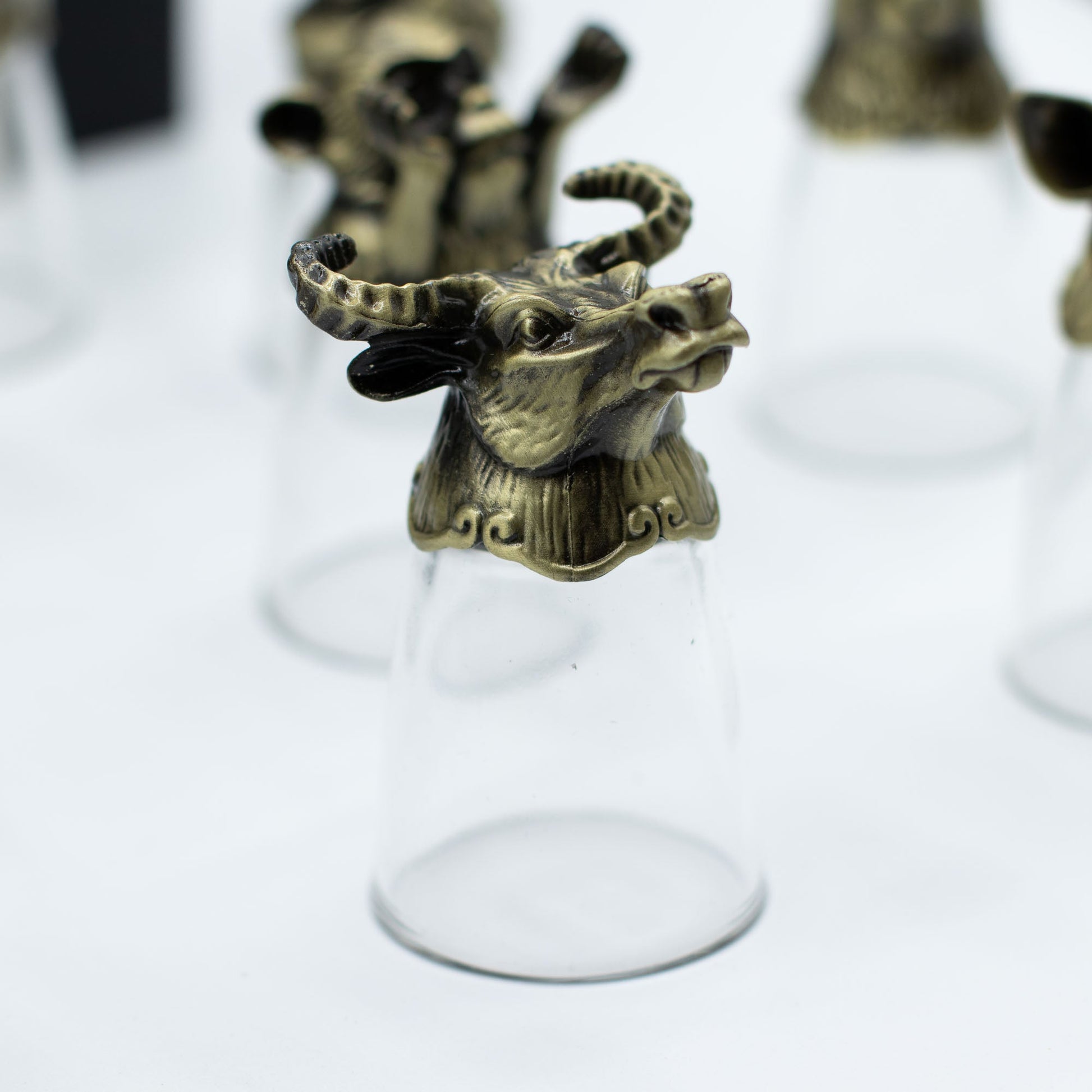 Set of 12 x 25ml Mystical Zodiac Creatures Glasses - Antique Bronze product packaging on clean background from Quintessential Holistic Health Ltd