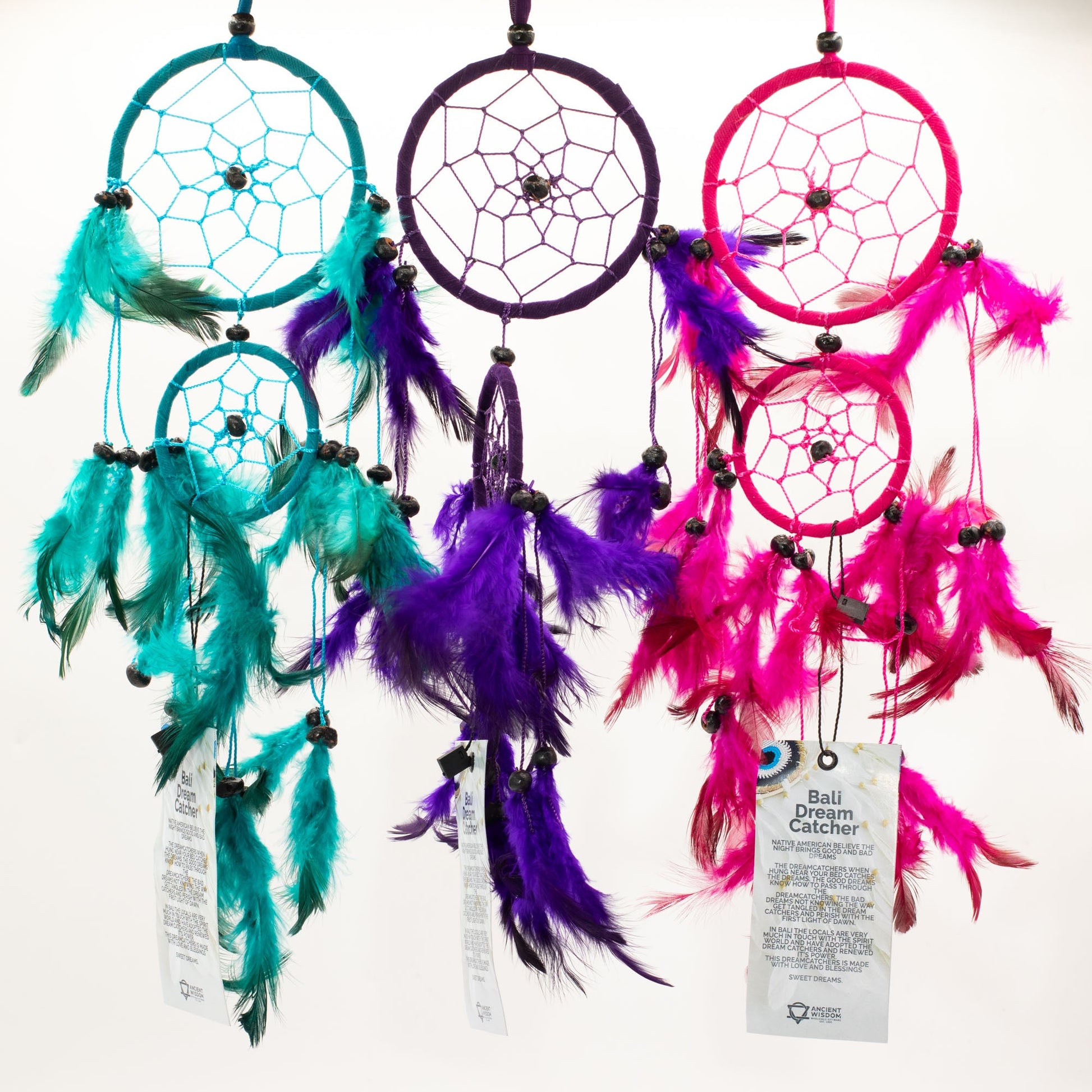 6 x Hand Crafted Dreamcatchers - Medium / Round / Pink, Turquoise and Purple product packaging on clean background from Quintessential Holistic Health Ltd
