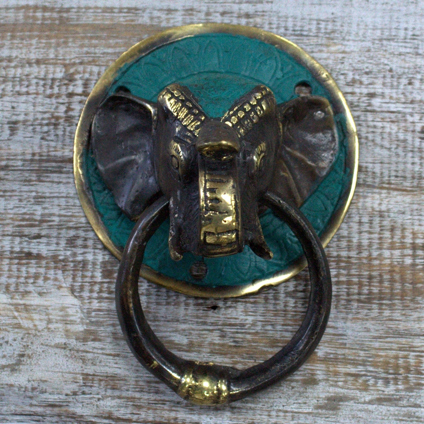 Animal Brass Door Knocker - Elephants Head product packaging on clean background from Quintessential Holistic Health Ltd