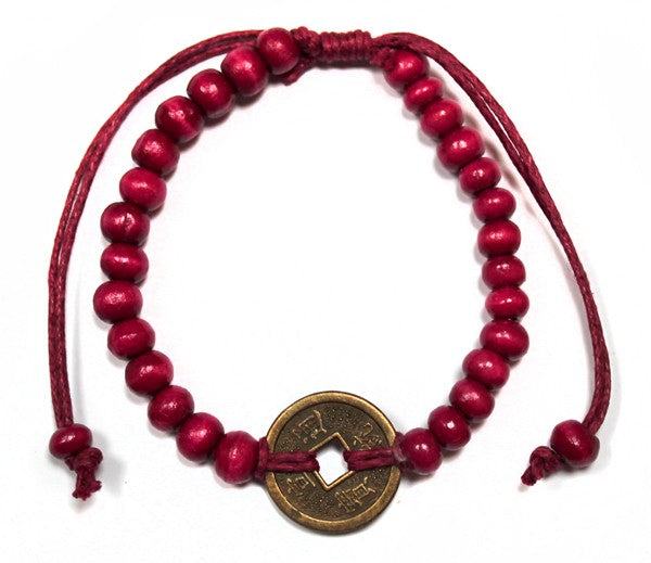 Feng Shui Good Luck Bracelet - Red product packaging on clean background from Quintessential Holistic Health Ltd