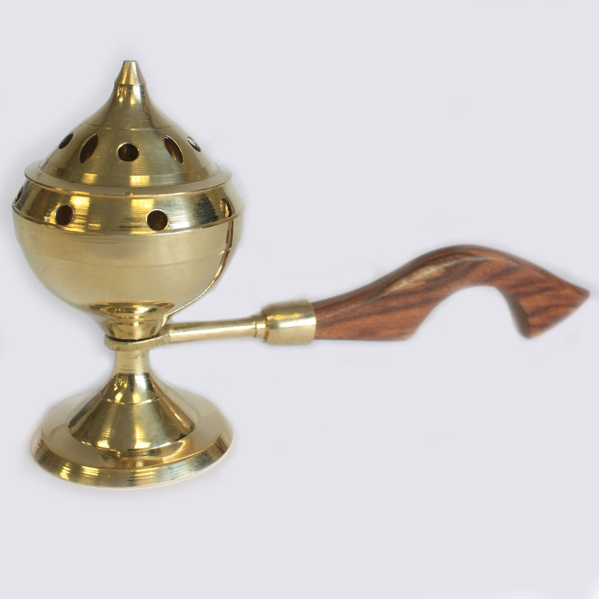 Small Plain Brass Incense Burner with Handle, with a domed perforated lid and dark curved wooden grip by Quintessential Holistic Health Ltd