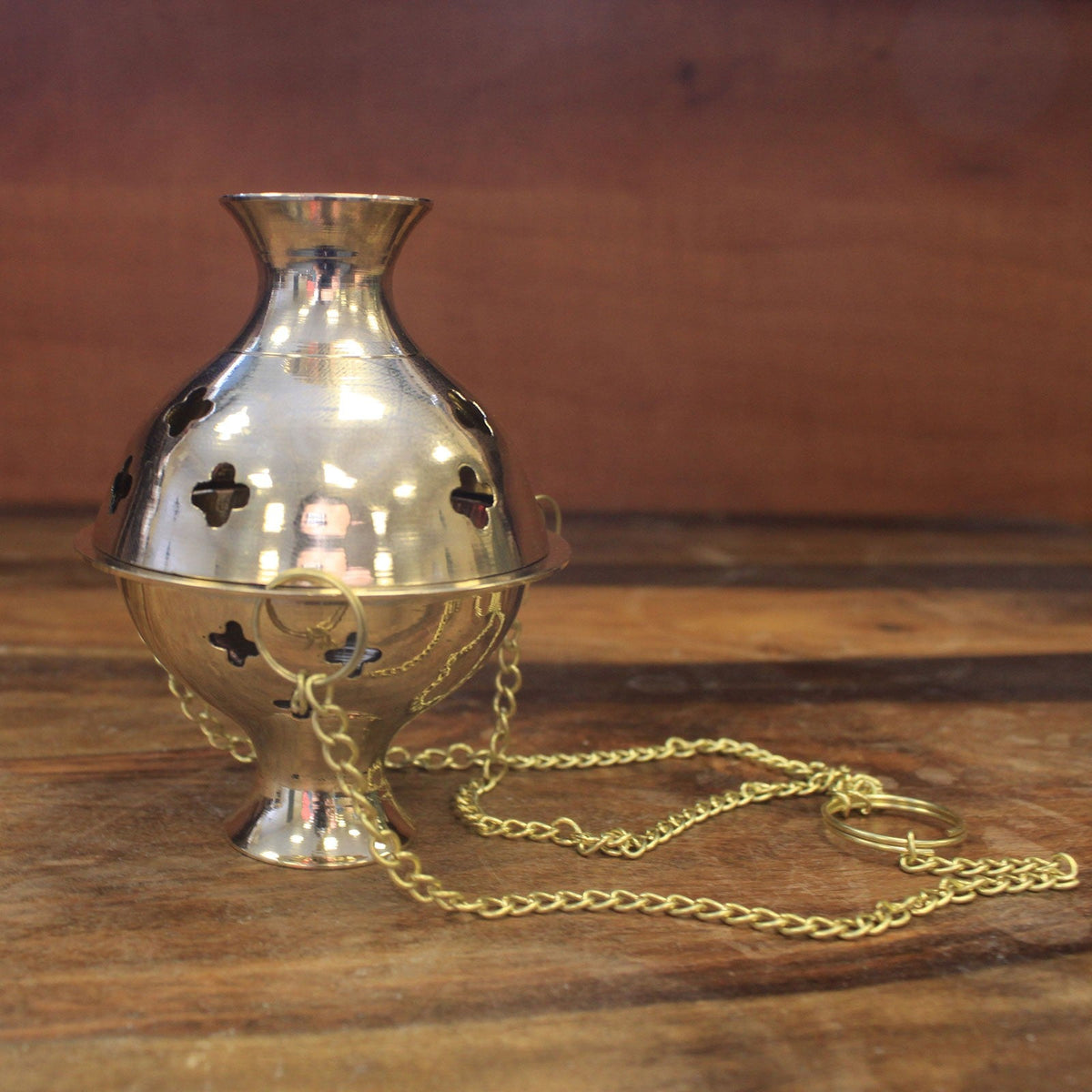 Brass Hanging Incense Burner - Plain with a flared rim, pierced rounded body and coiled gold-tone chain by Quintessential Holistic Health Ltd
