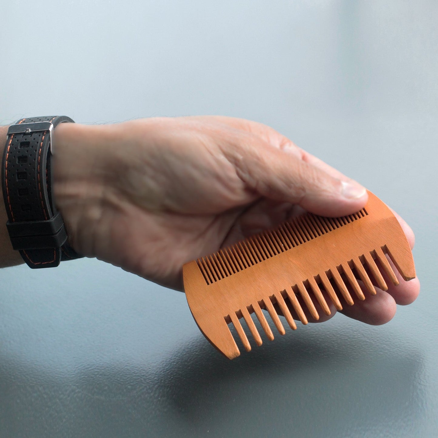 Eco-Friendly Bamboo Two Sided Beard Comb product packaging on clean background from Quintessential Holistic Health Ltd