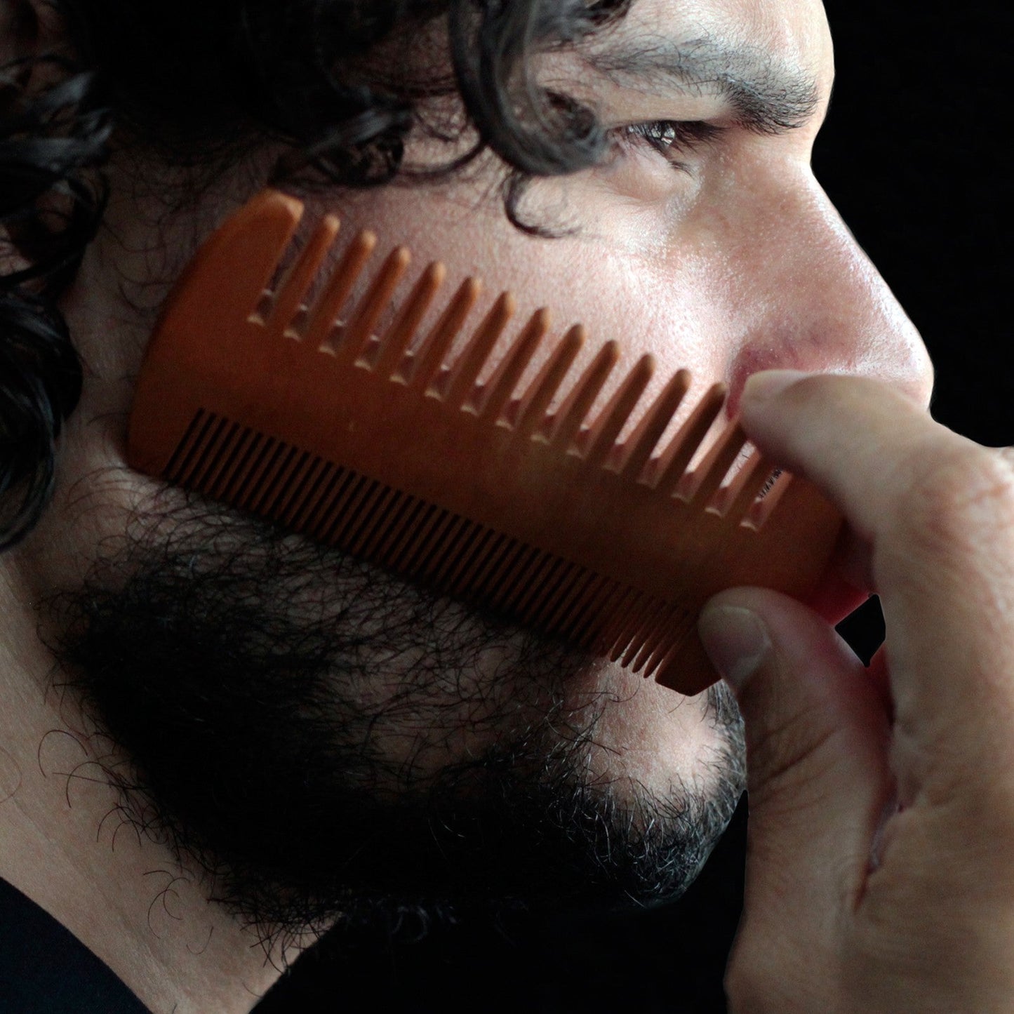 Eco-Friendly Bamboo Two Sided Beard Comb product packaging on clean background from Quintessential Holistic Health Ltd